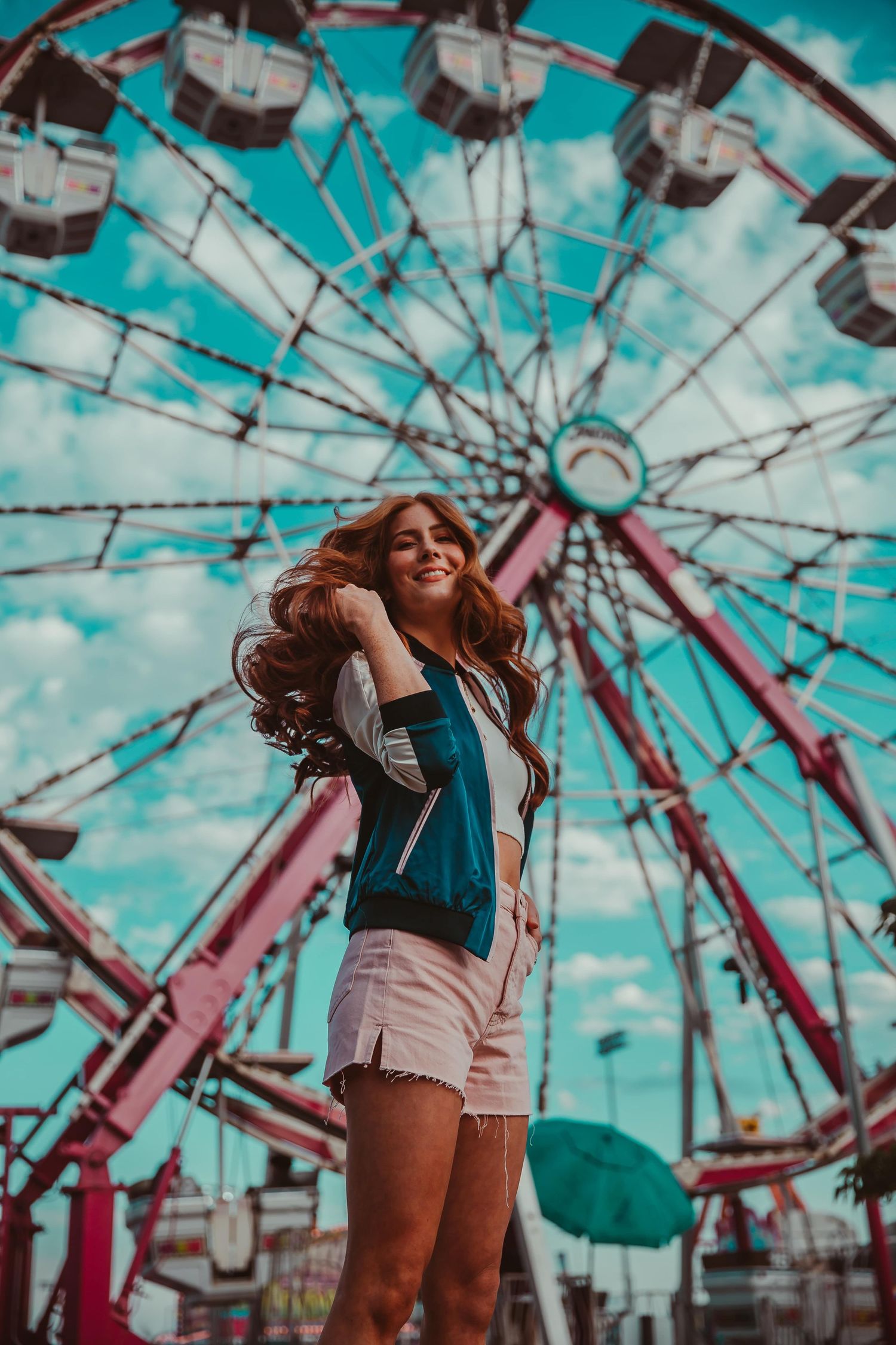chicago model kelly nicole at carnival in elk grove village illinois, cloudy day, blue skies, red hair
