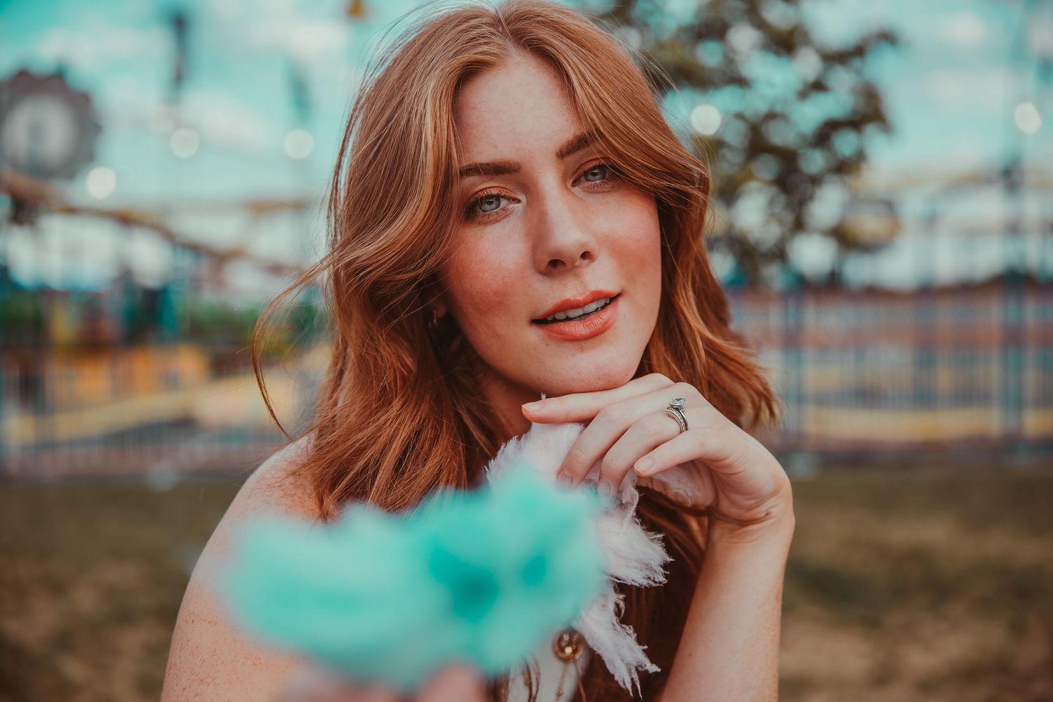 chicago model kelly nicole at carnival in elk grove village illinois, cloudy day, blue skies, red hair
