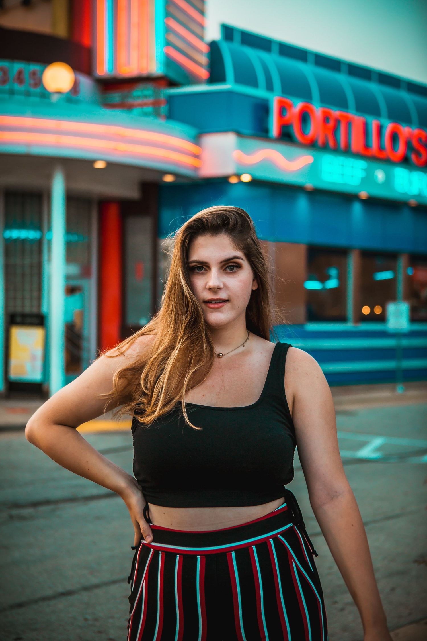 model at portillos in chicagoland area night photography