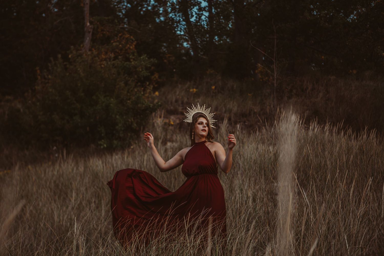 model at indiana dunes state park in red dress photography halo crown