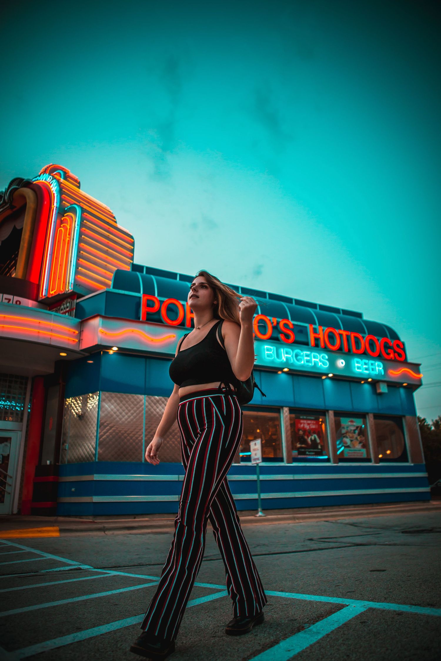 model at portillos in chicagoland area night photography