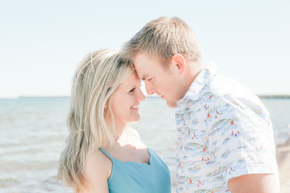 image of jillian and andy taken by | jennifer pesola | photographer | in lac la belle michigan