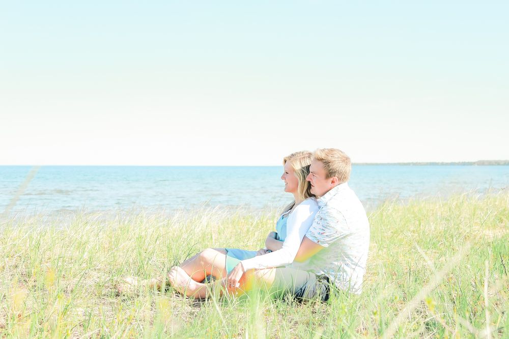 image of jillian and andy taken by | jennifer pesola | photographer | in lac la belle michigan