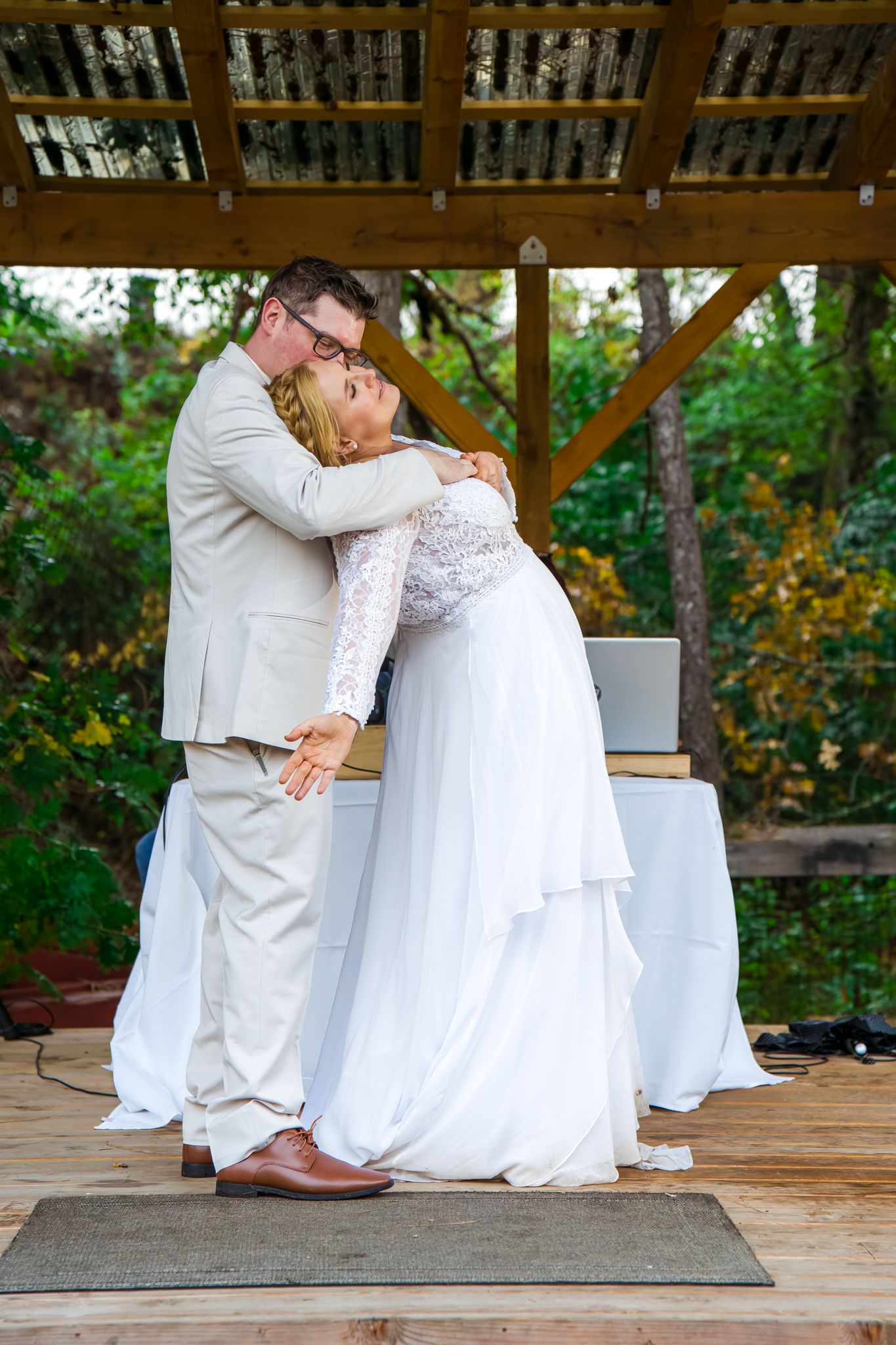 groom catches bride at the end of the dance