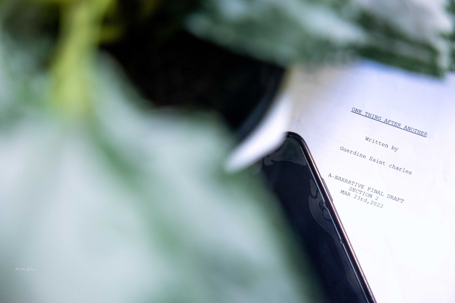 Close-up shot of printed documents with text visible in soft focus.