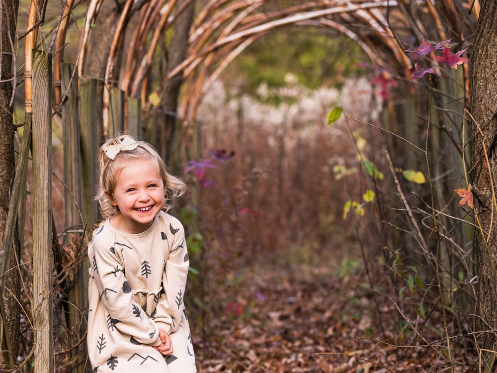 little girl laughing fall