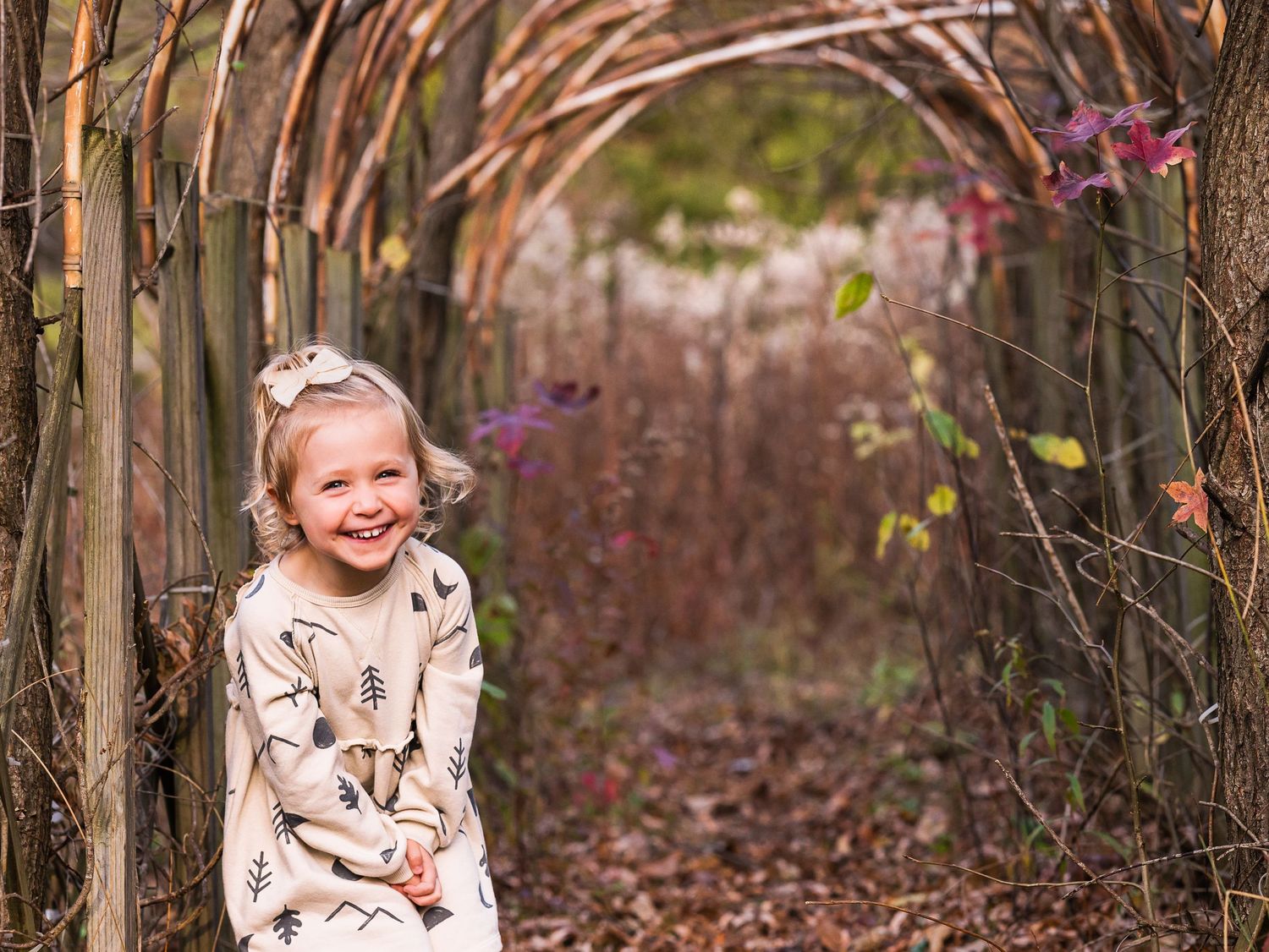 little girl laughing fall