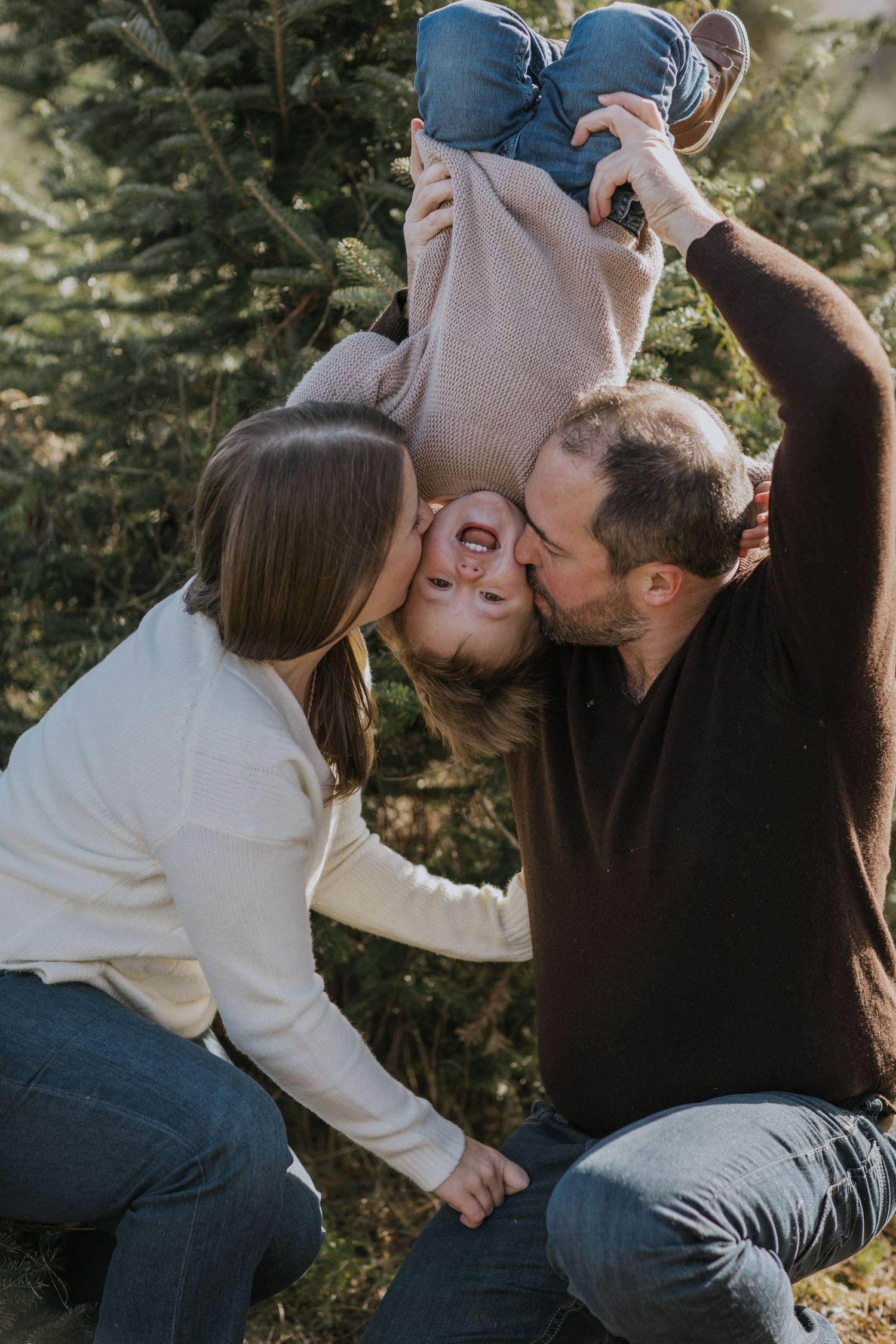 Tender family embraces photographed in sequence during winter photo session.