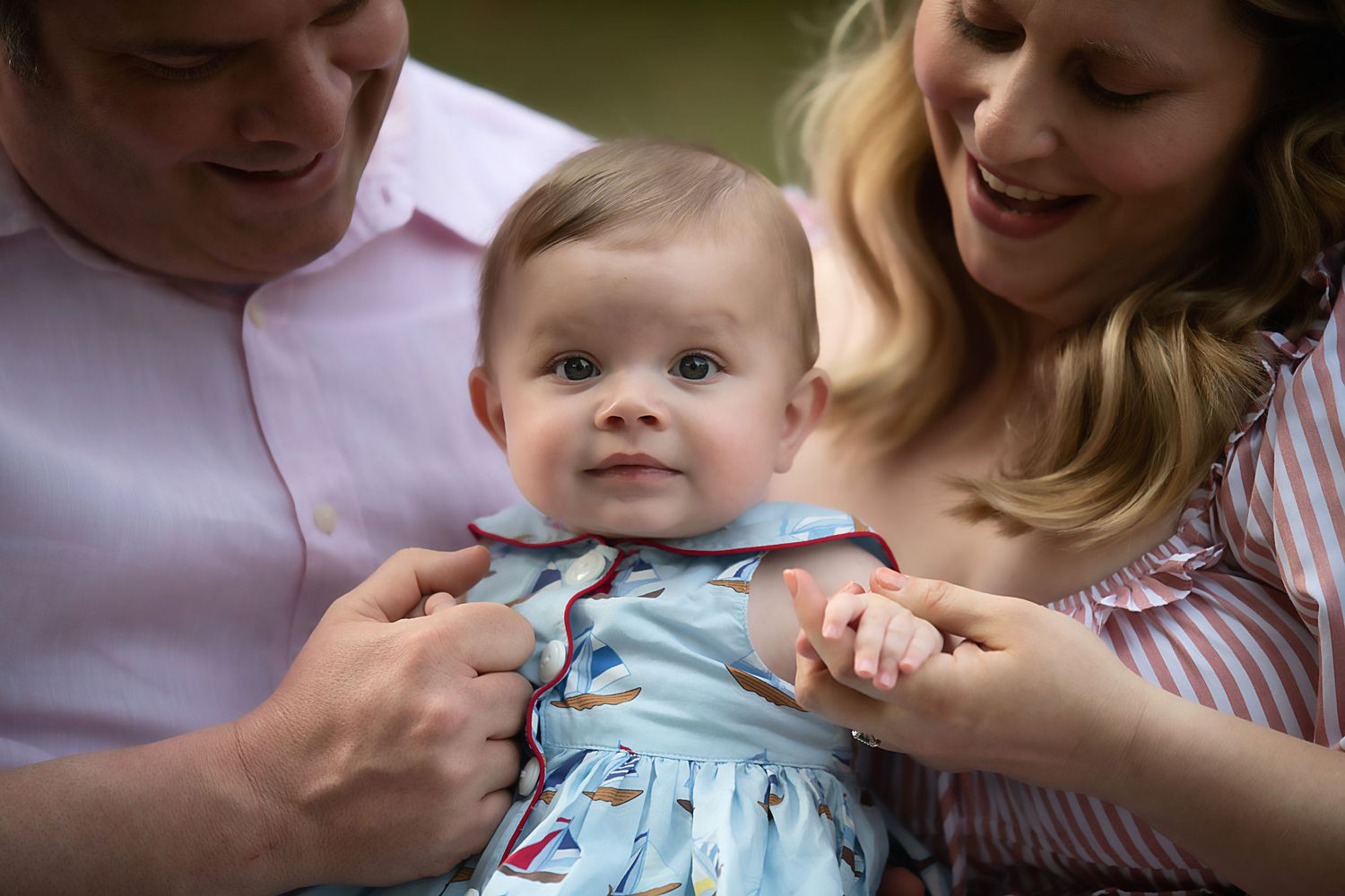 A lifestyle family photography session featuring playful moments and natural interactions.