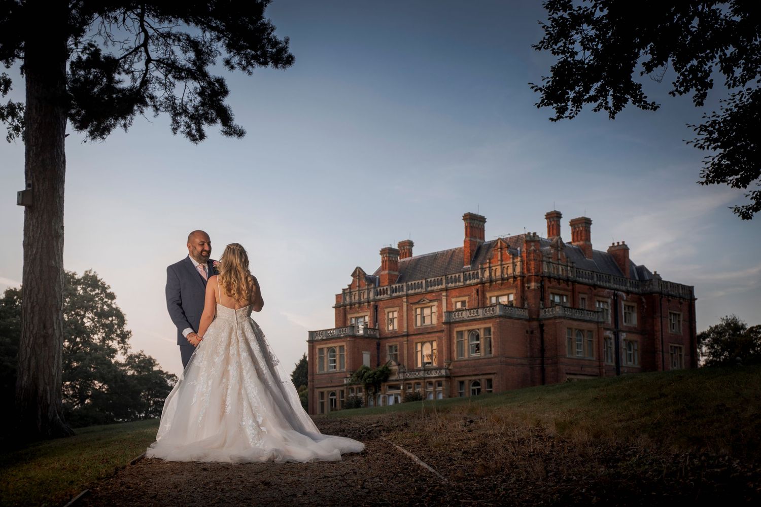 wedding photography with rossington hall in the background