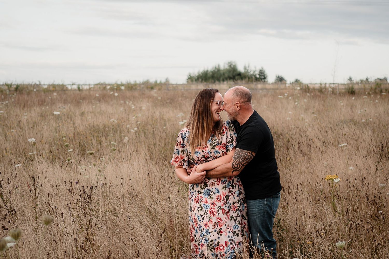 A camera-shy couple have fun together on their pre-wedding shoot to calm their nerves in front of the camera