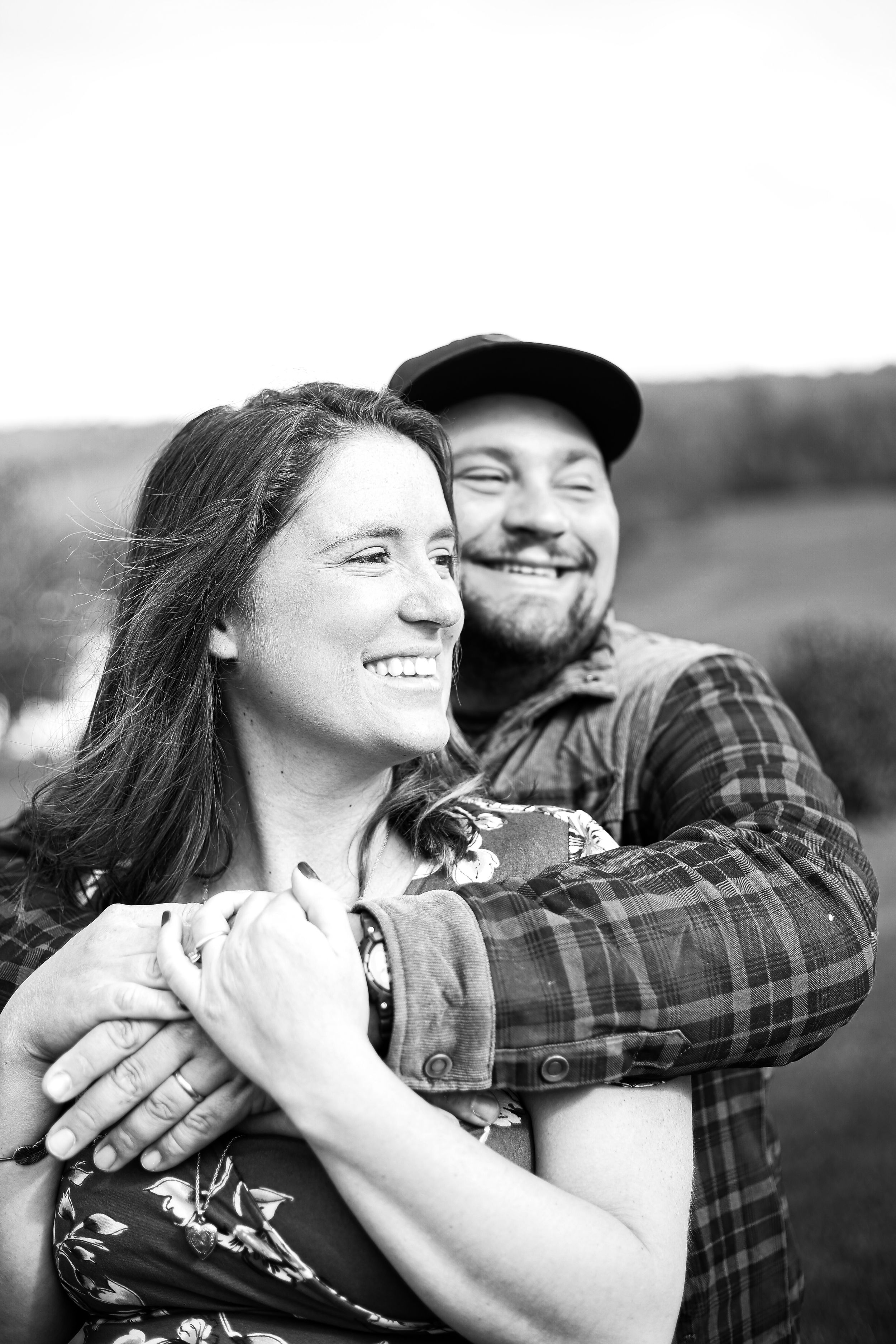 husband and wife portrait new baby maternity on farm in cortland ny