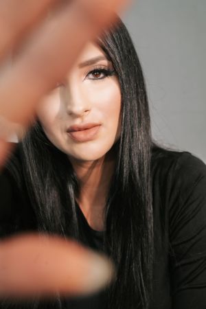 Artistic portrait series with soft focus and dramatic lighting.