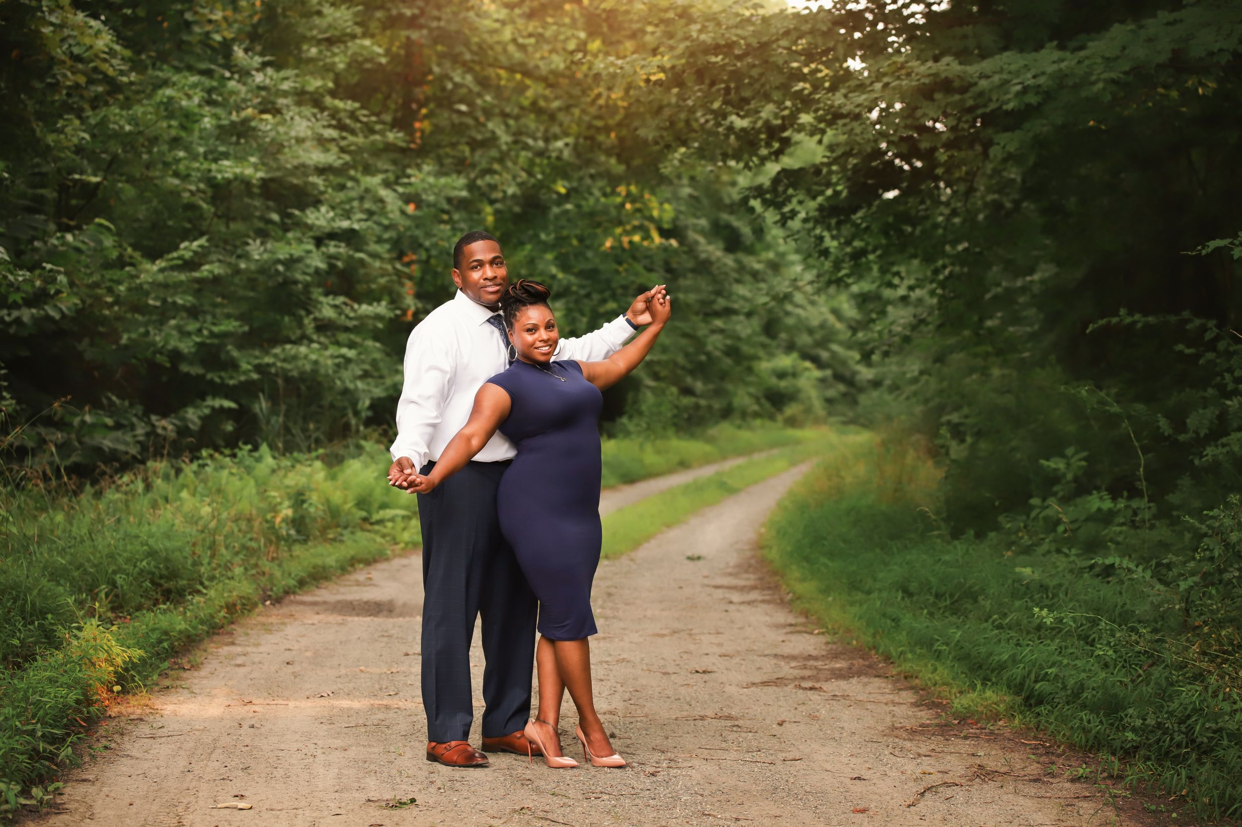 fine art family outdoor portrait with couple in the woods during summer