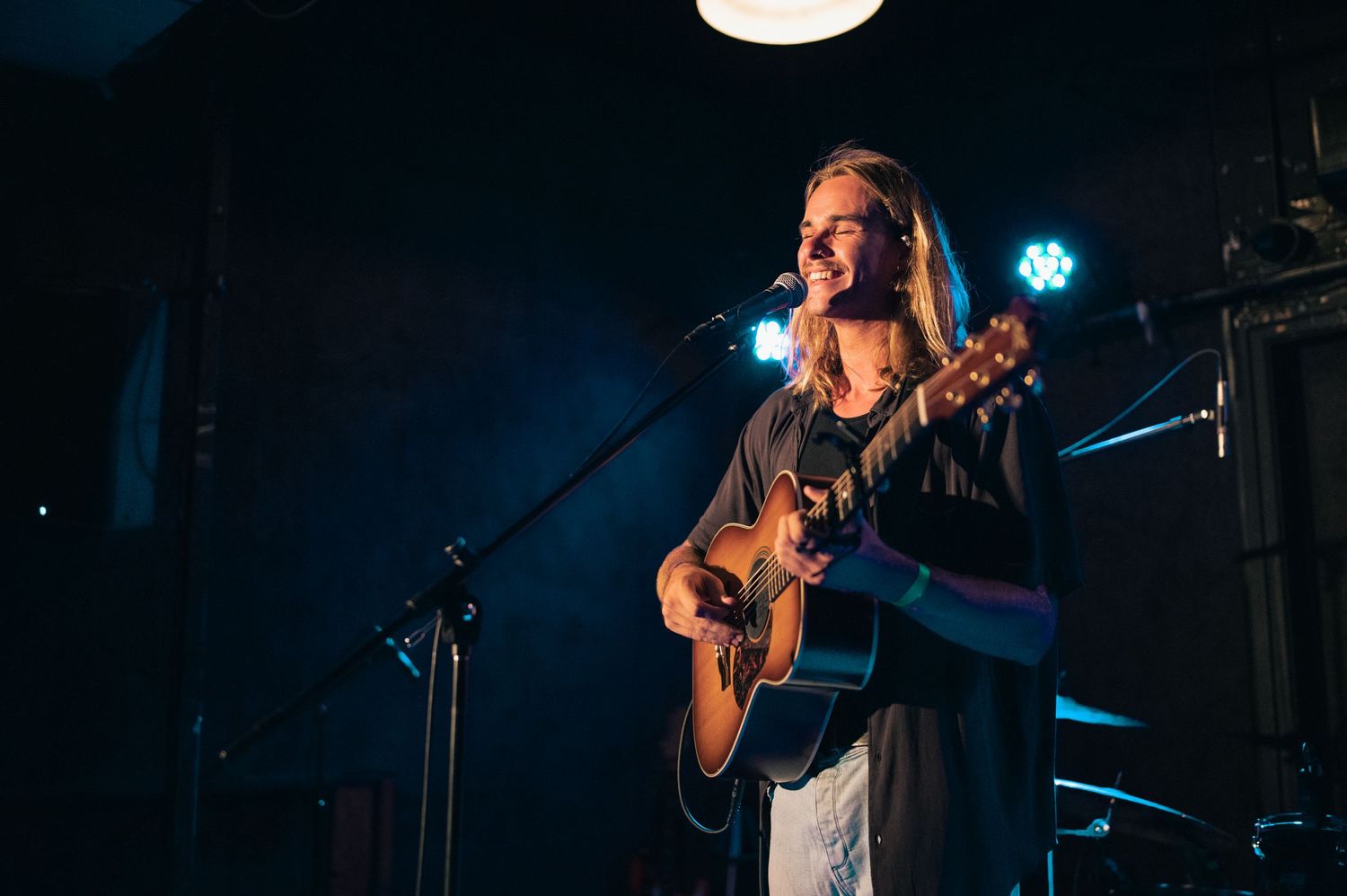 Austin Mackay portait at live music show in west end