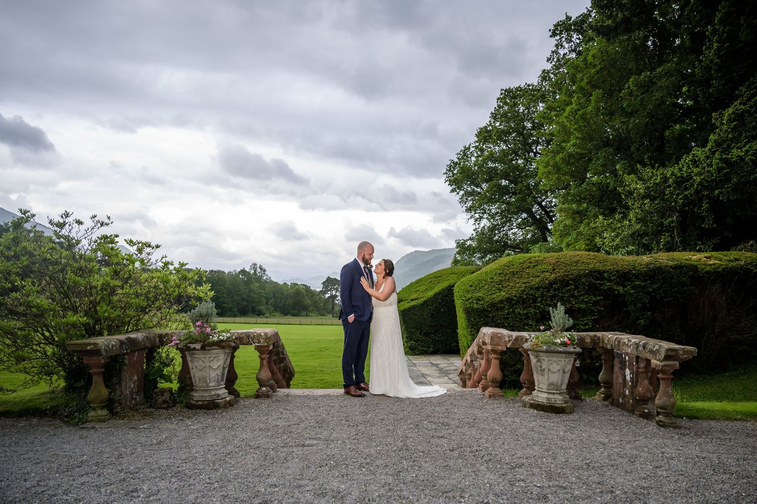 Bride and groom in gardens at Armathwaite Hall wedding