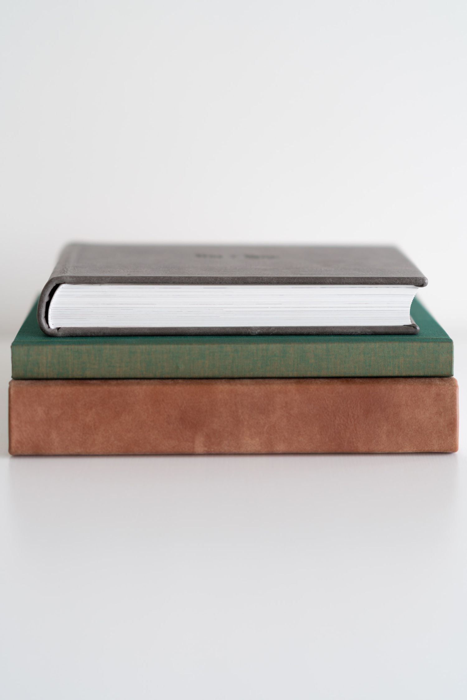 memory album in outback leather, green linen and boulder leather