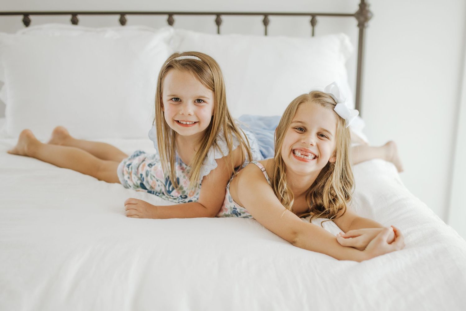 two sisters smiling at Lemon Drop Studio