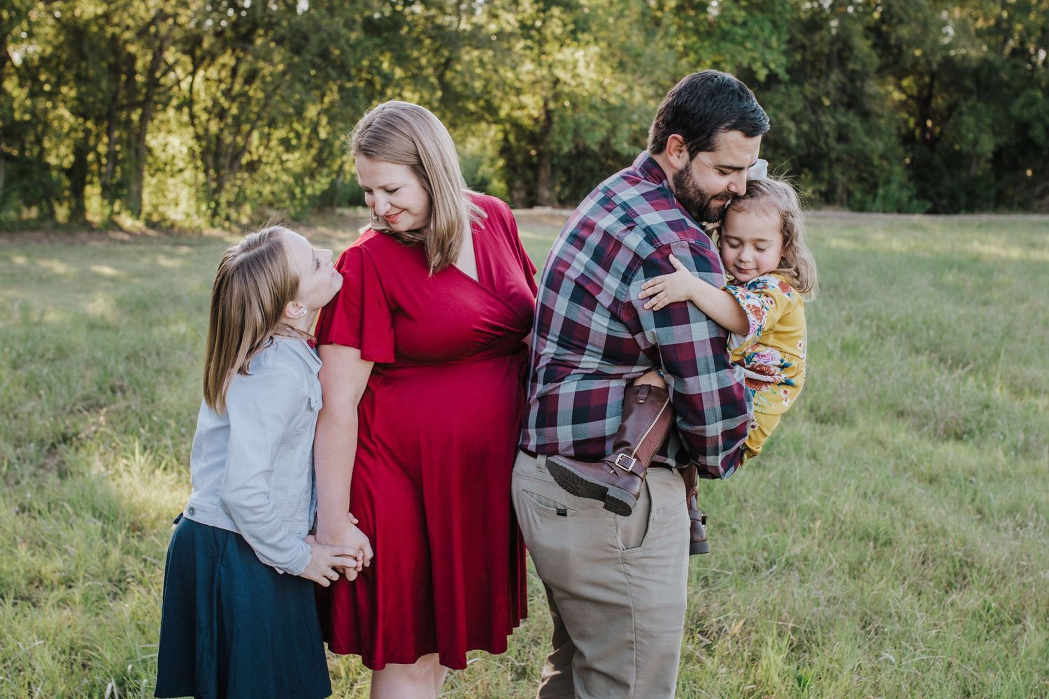Family of four in a field