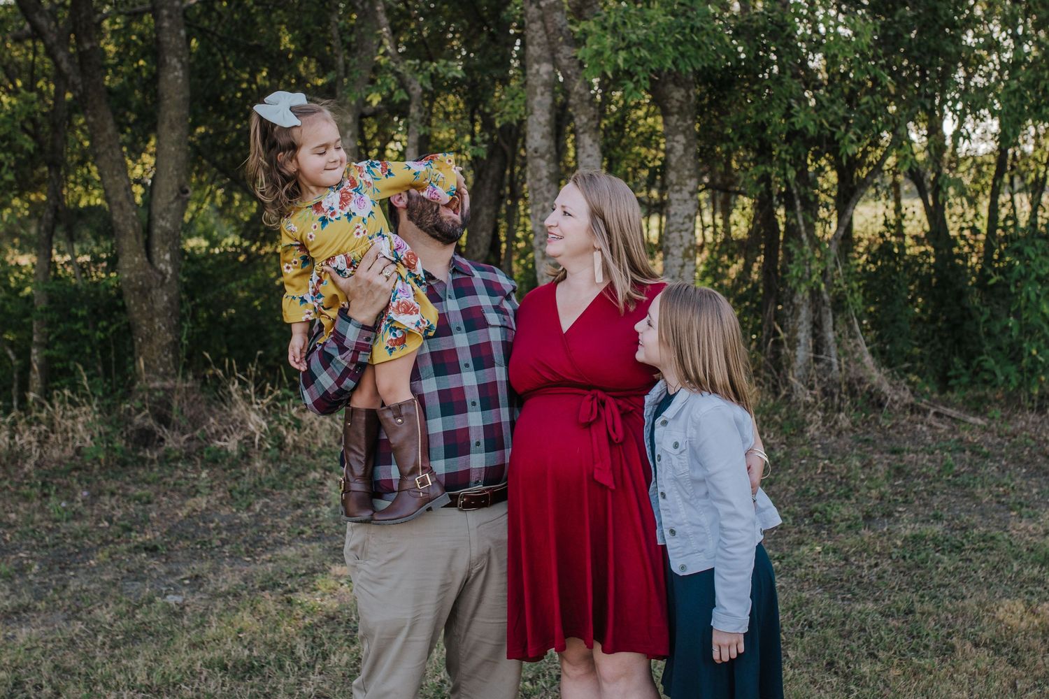 Family of 4 near trees
