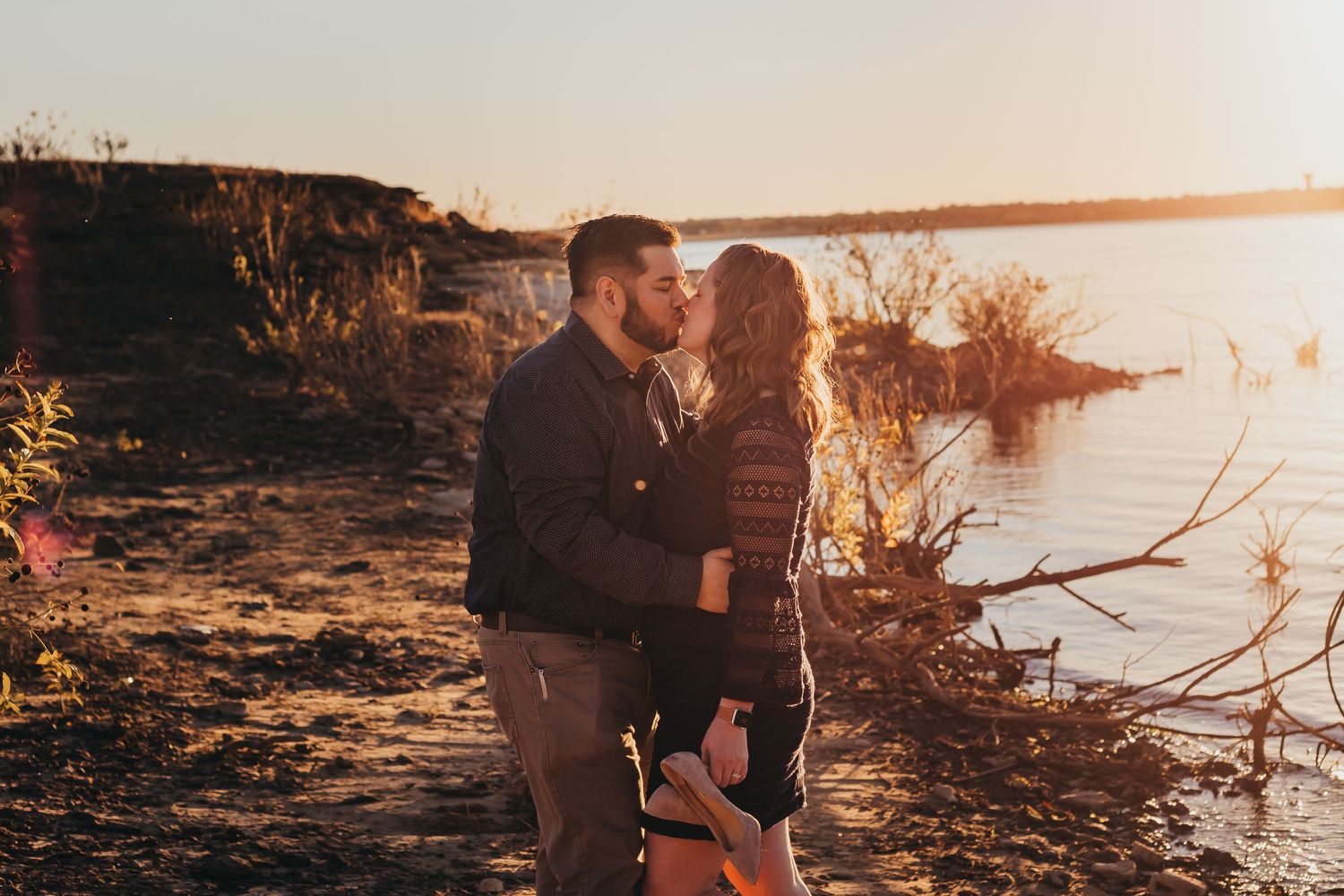 Couple by the water at Golden Hour