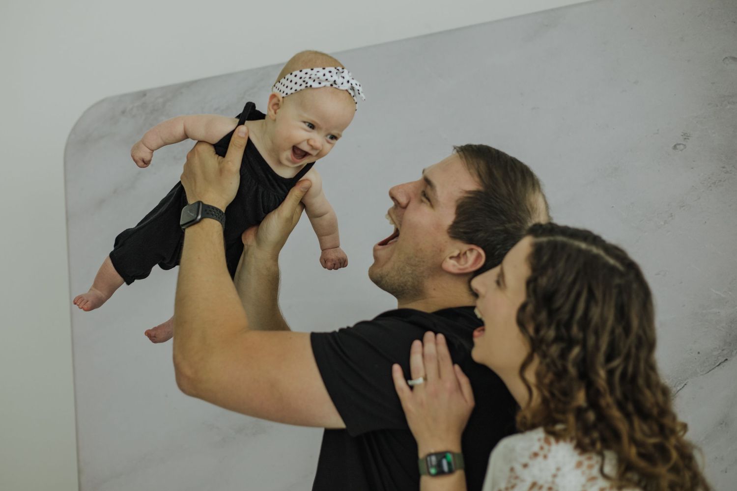 Family of three with 6 month old