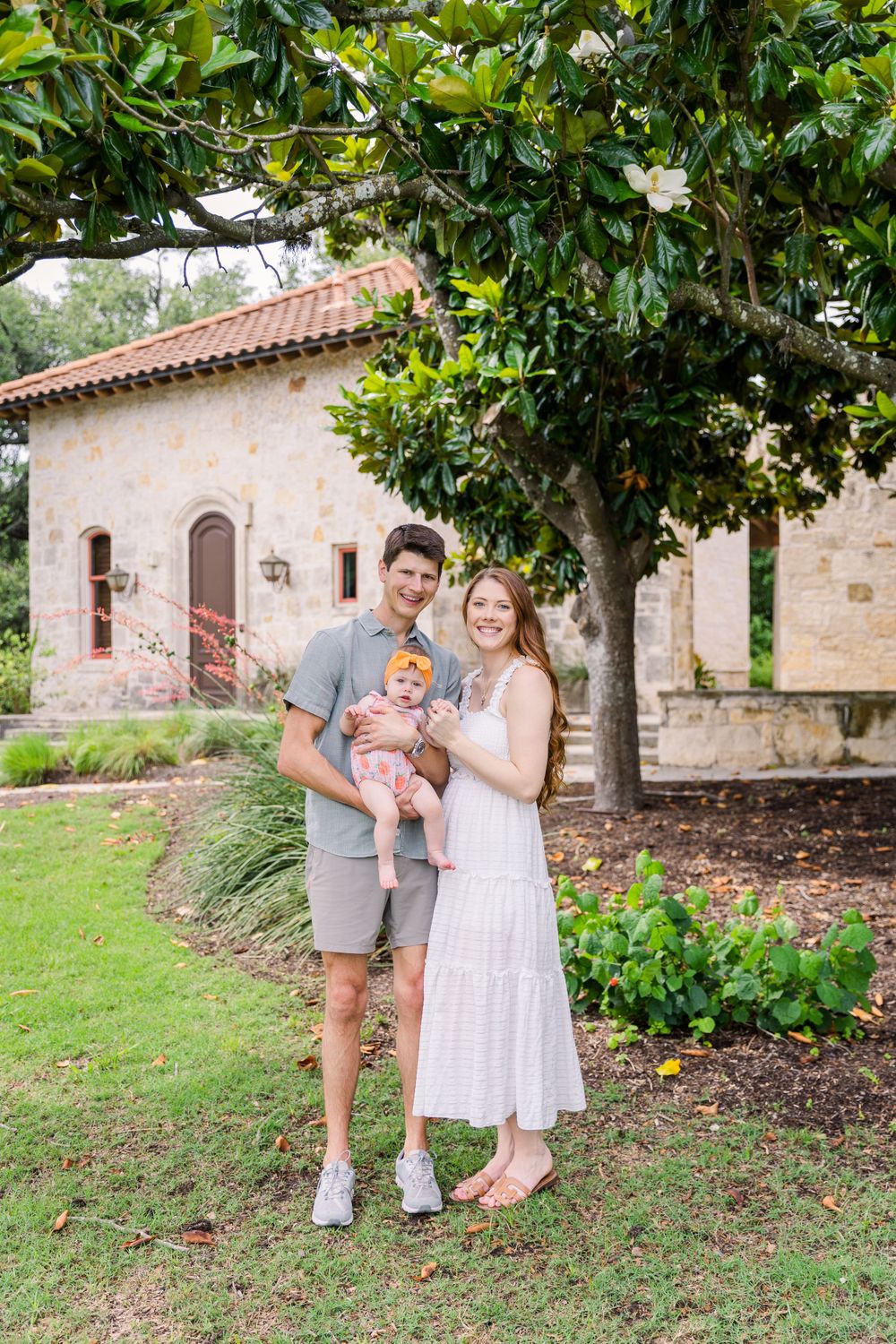 family portrait under magnolia trees at Garey House