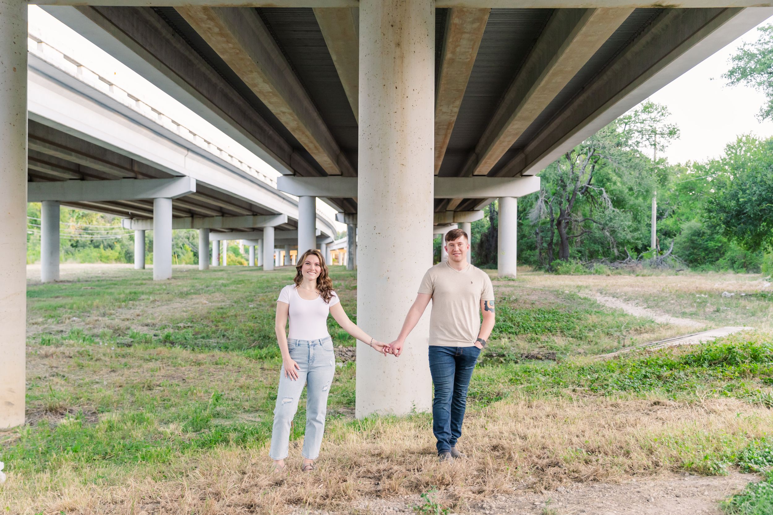engagement portrait under overpass