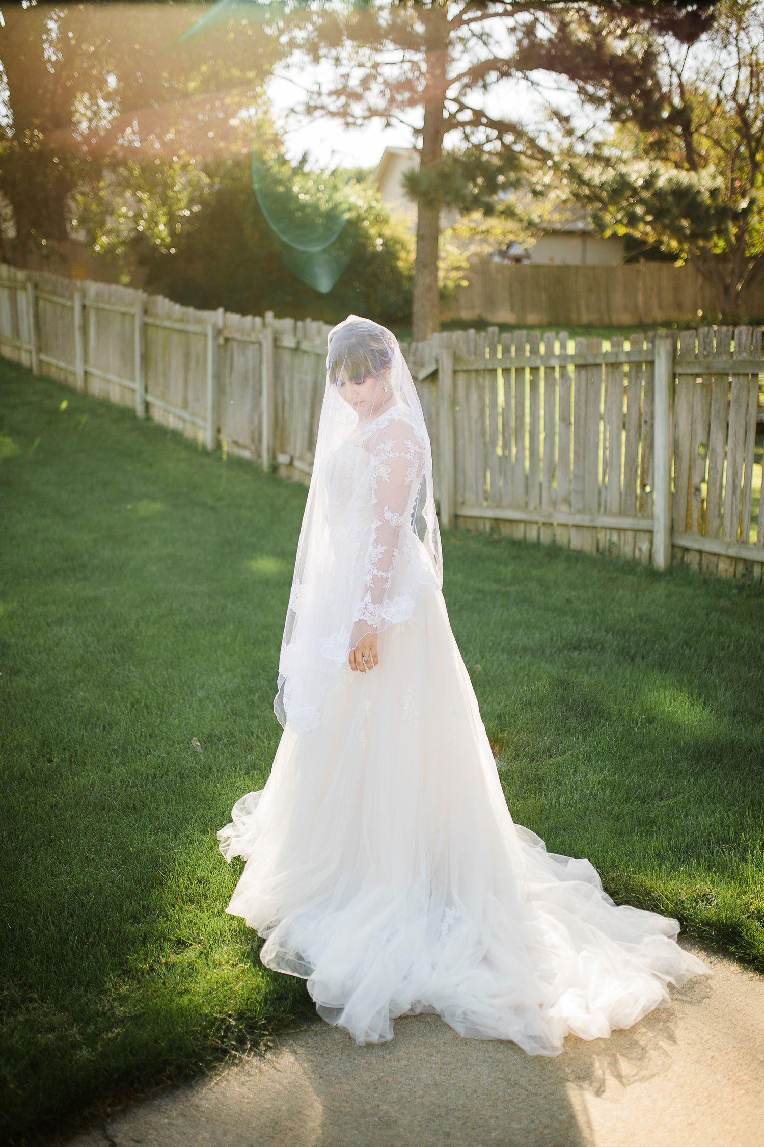 Bride in sunlight by Hudson Valley wedding photographer
