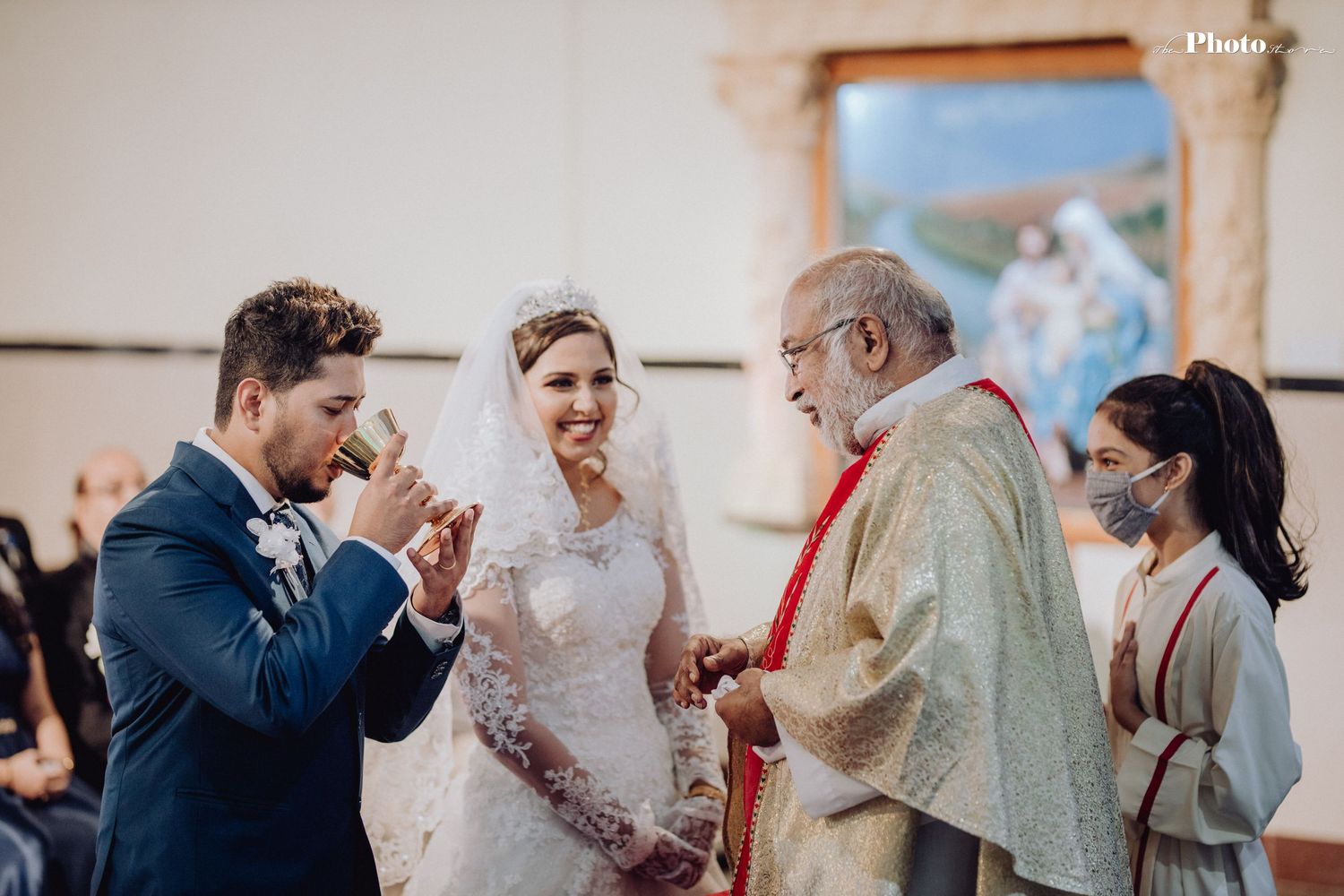 Joyful wedding celebration with guests and couple sharing special moments.