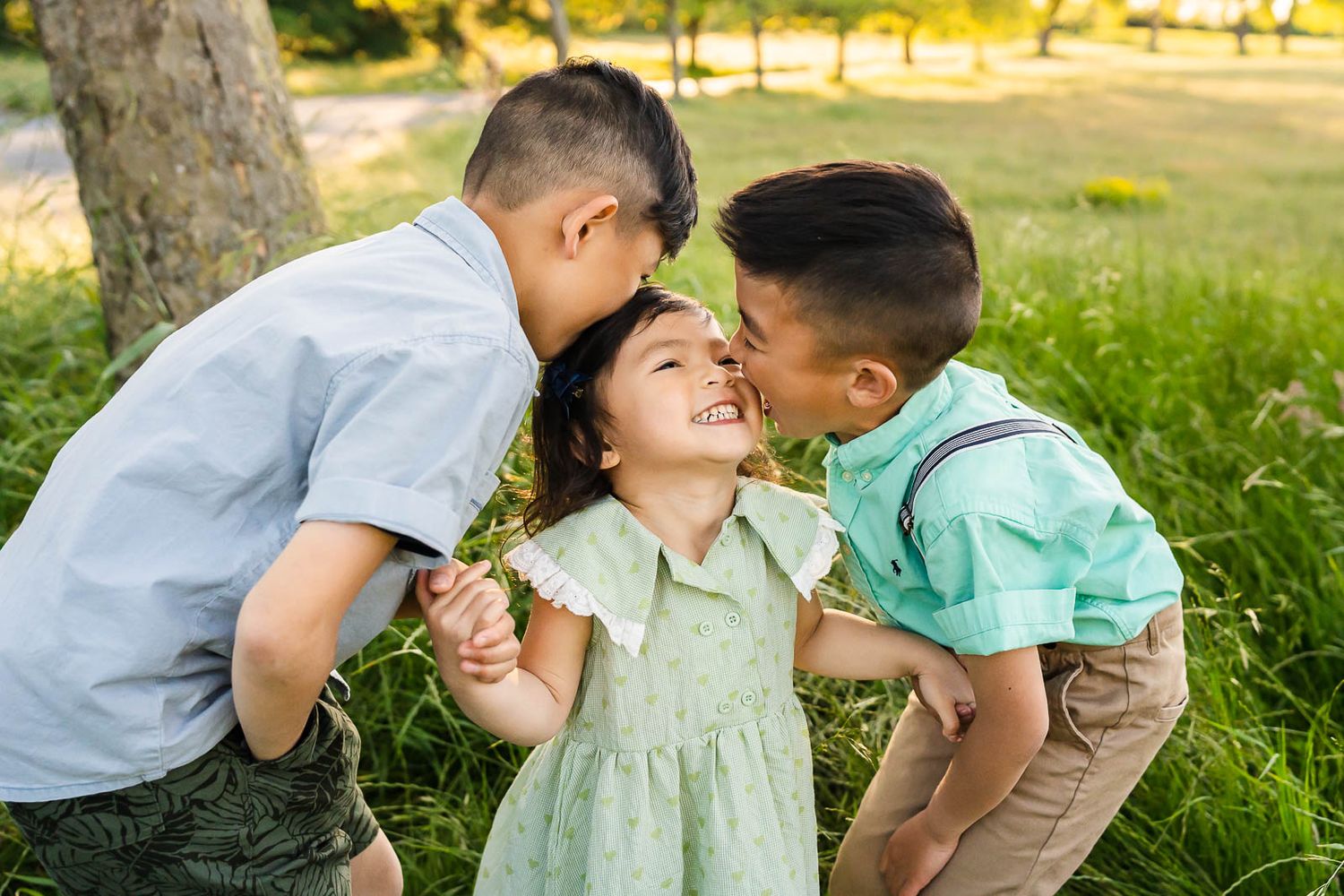 Candid smiling photo of siblings at Discovery Park