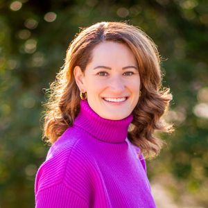 A licensed professional counselor poses for new headshots for her DC specialty health psychology practice
