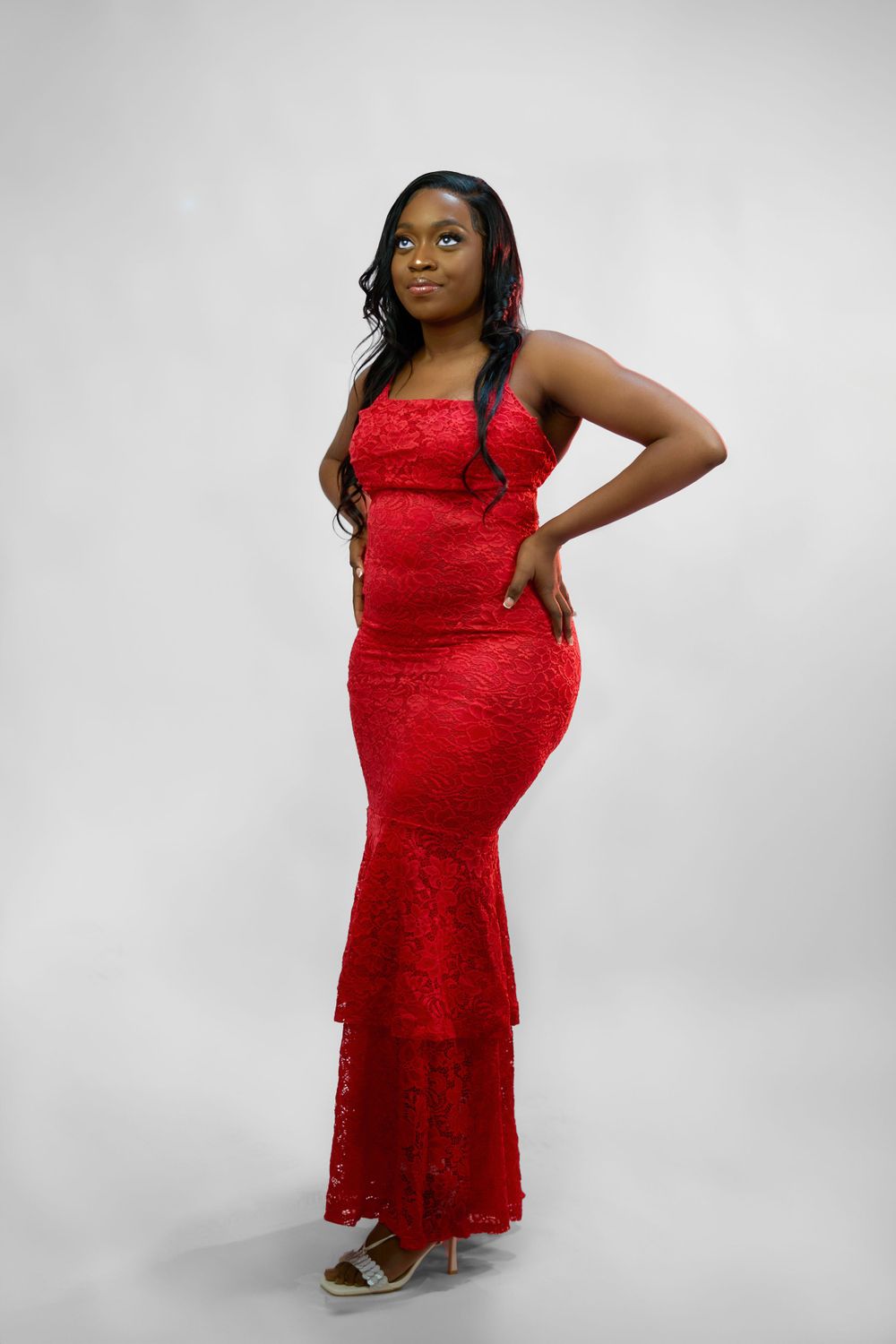 Full length studio portraits in red lace dress showing different standing poses.