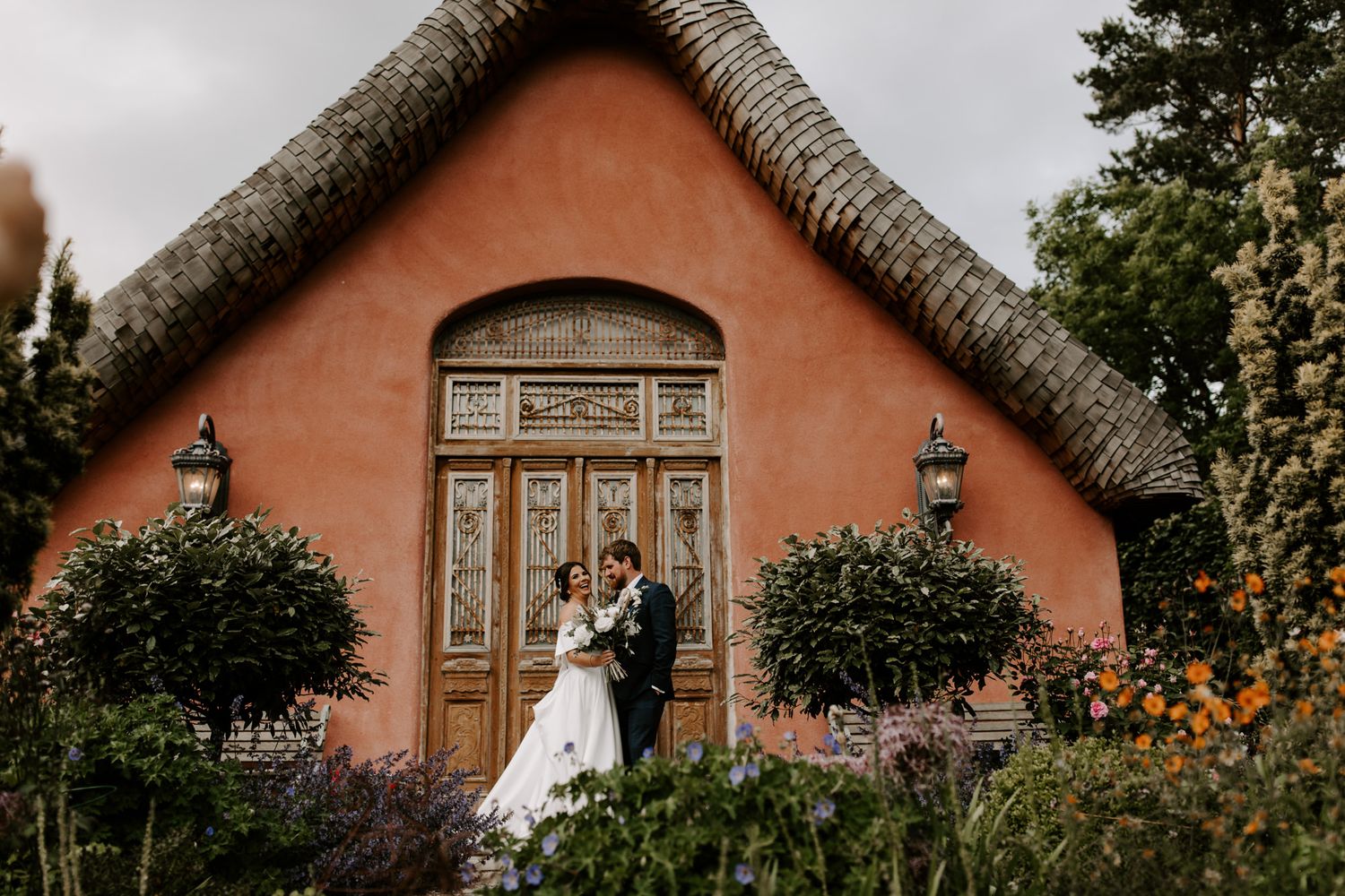 Le Petit Château, Northumberland, Couple in front of the wedding reception