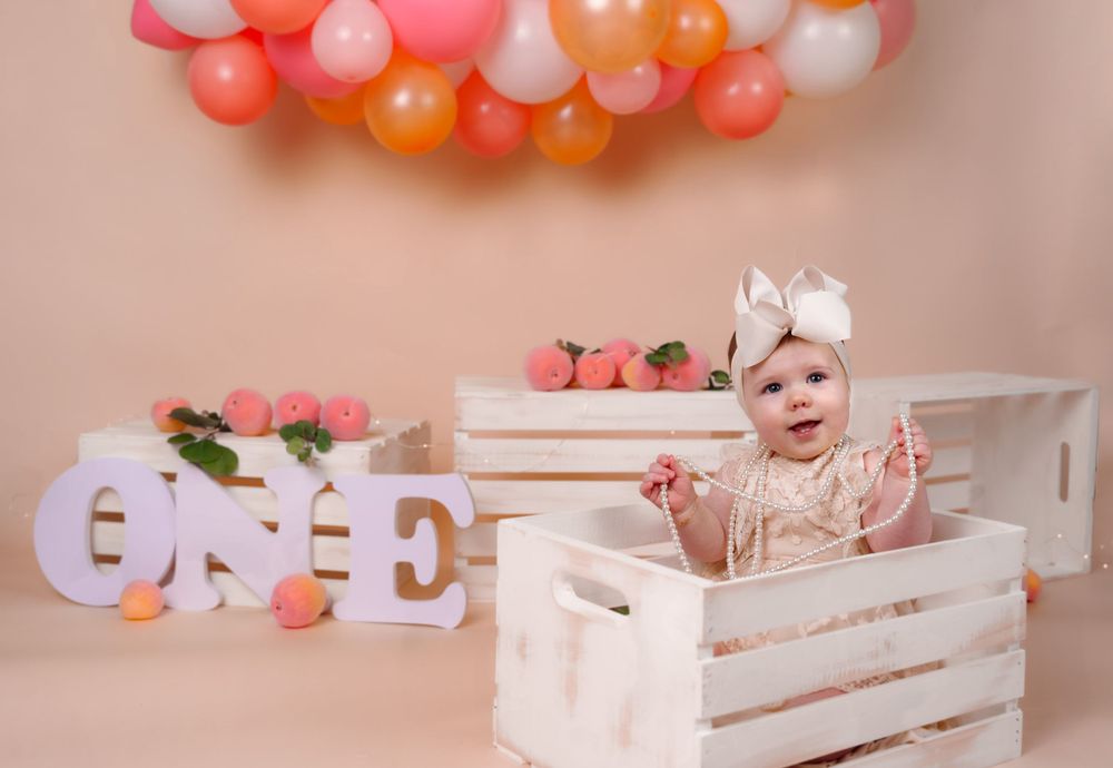 midland tx cake smash photographer photographers midland tx peach cake smash session first birthday photo session milestone session