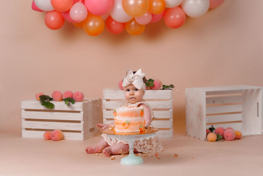 midland tx cake smash photographer photographers midland tx peach cake smash session first birthday photo session milestone details