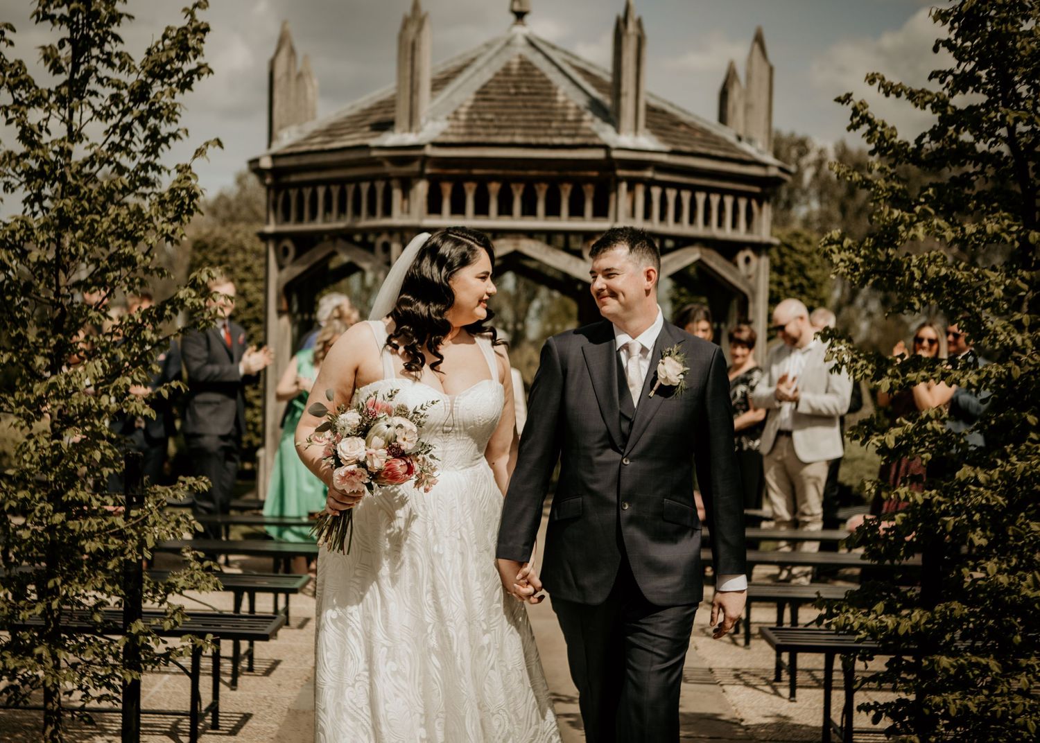 bride and groom walking down the aisle