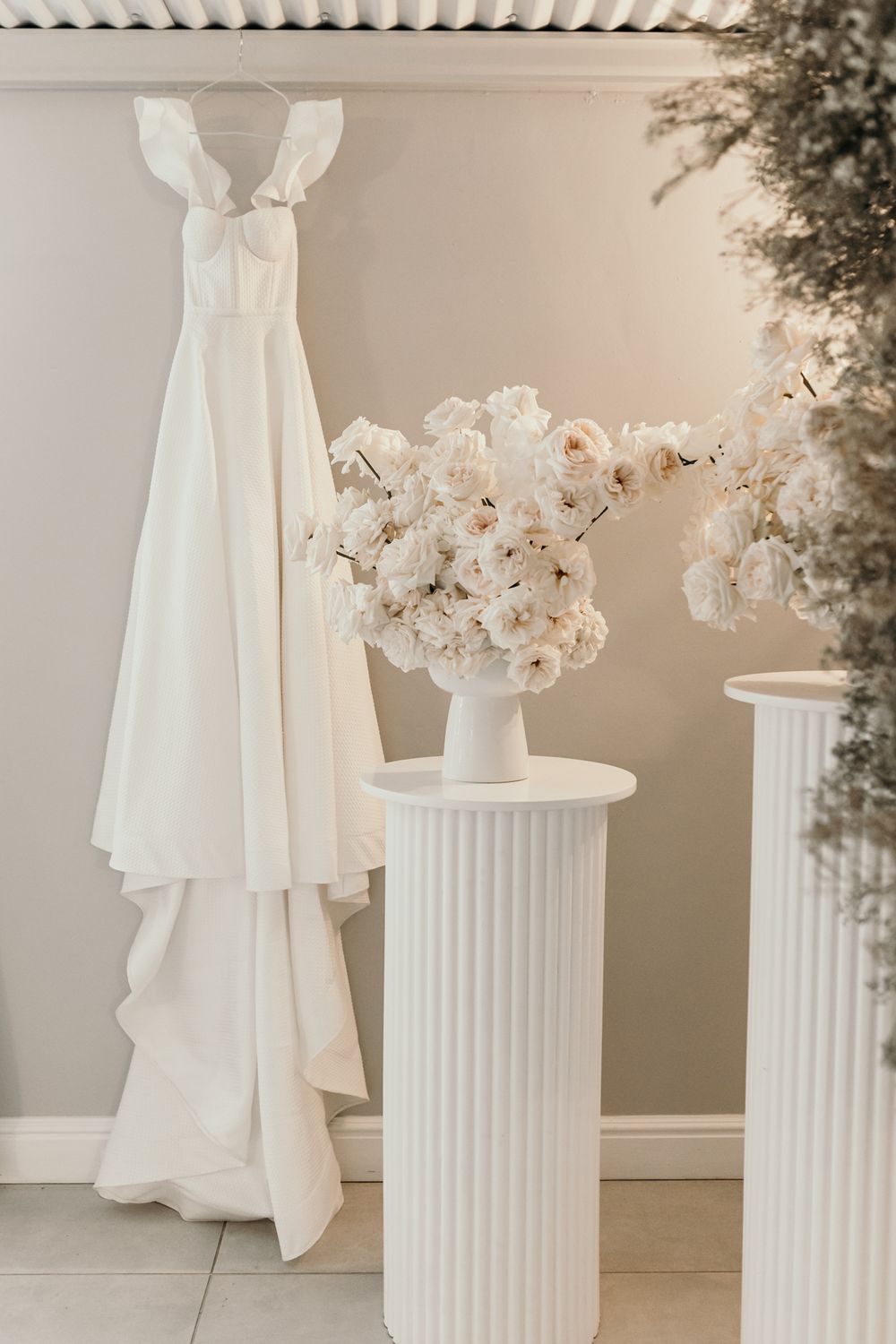 bride wedding dress handing in chapel