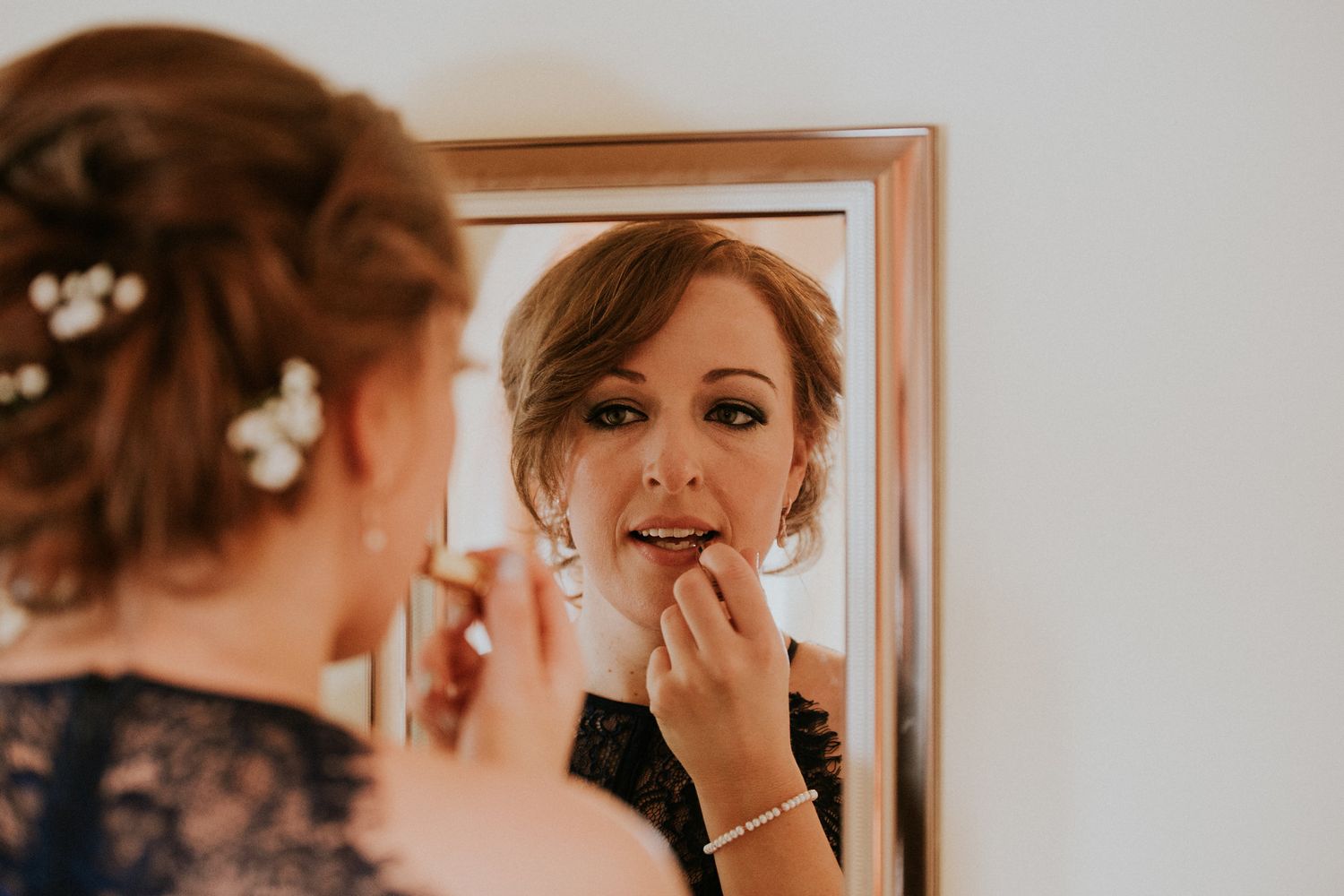 Close up shot of bridal makeup preparations in natural lighting.