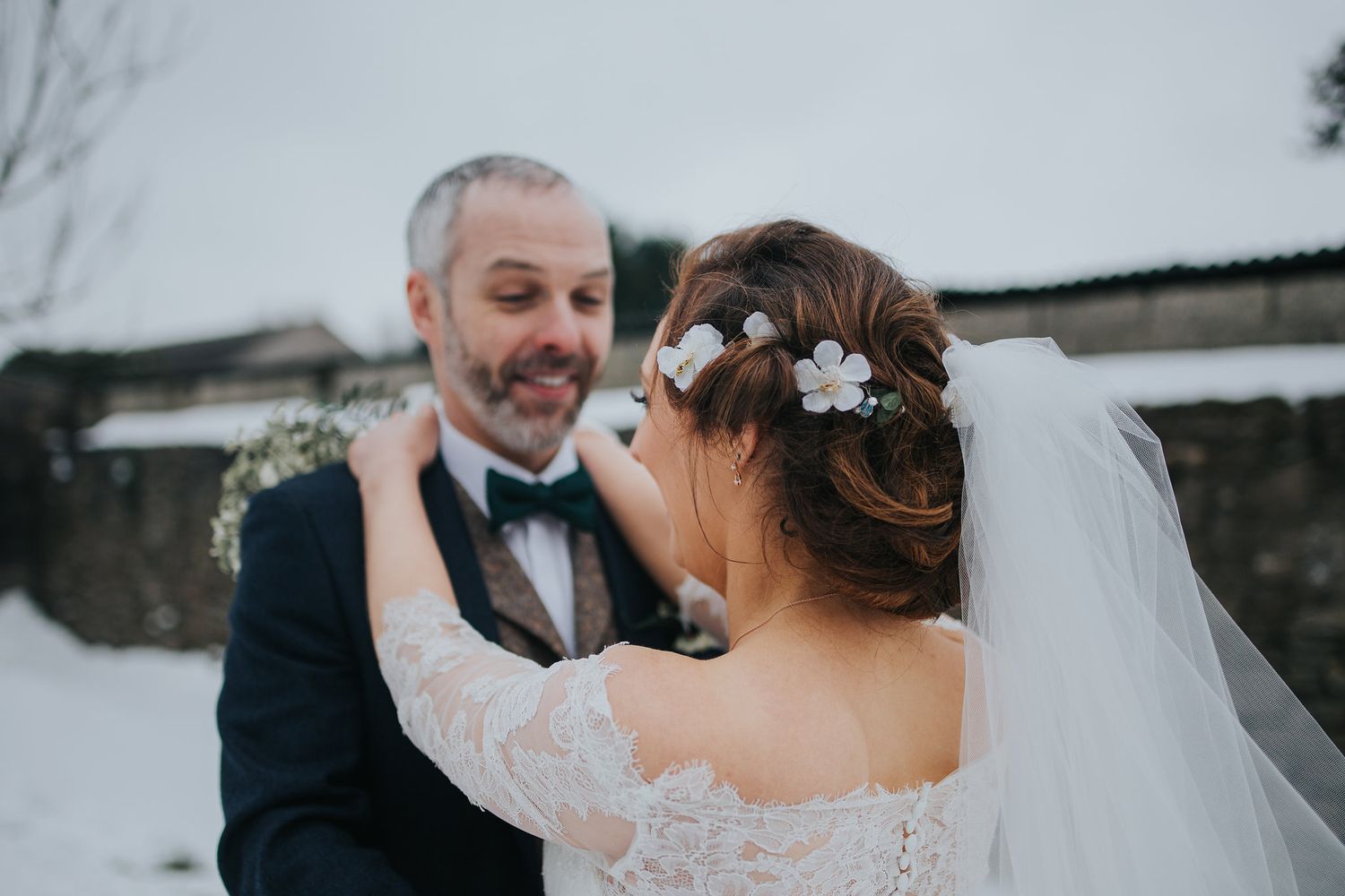 Wedding couple shares tender moments during their winter wedding photoshoot.
