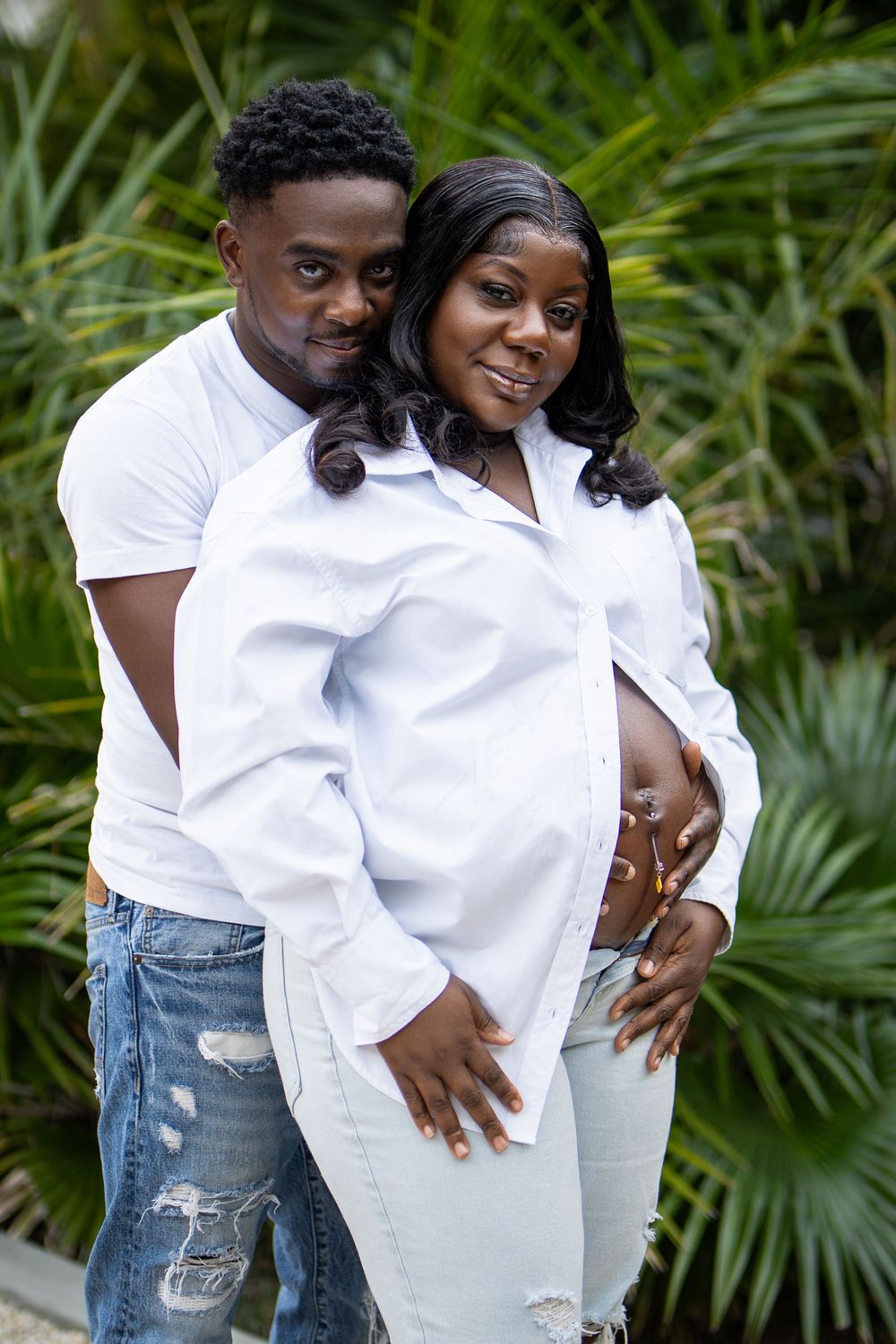 couple wearing white shirt standing in garden — natural light portrait by Timoy B Photography.