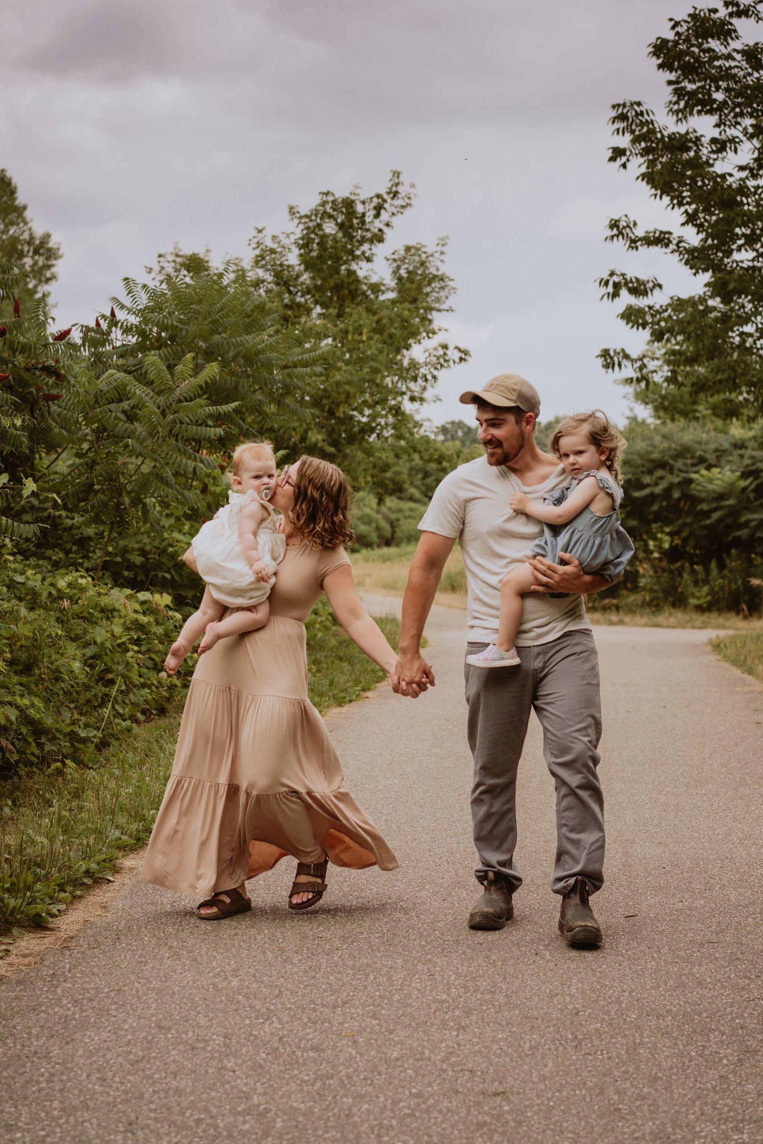 Image of family walking down path.