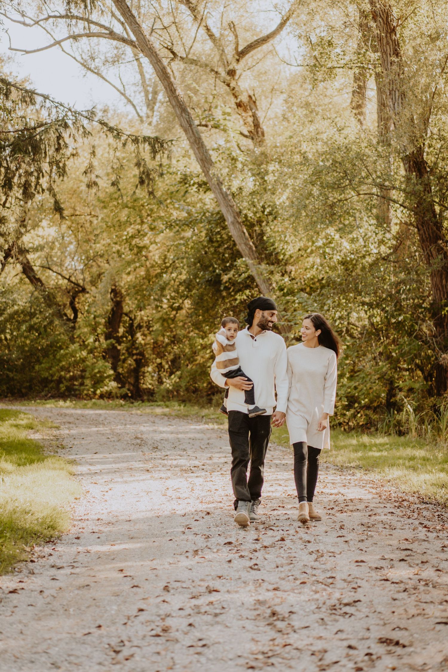 Image of family walking down path.