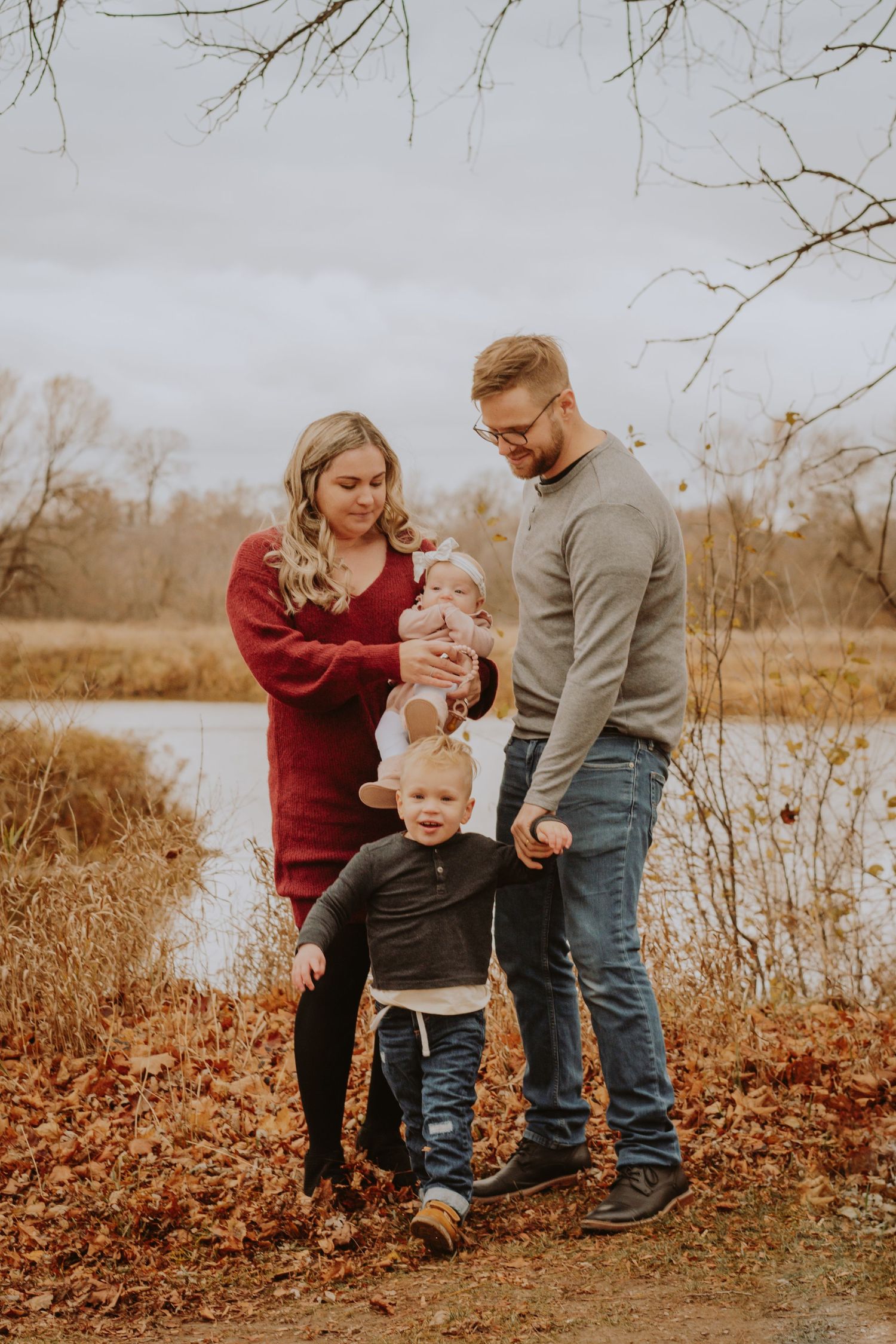 Image of family in front of water.