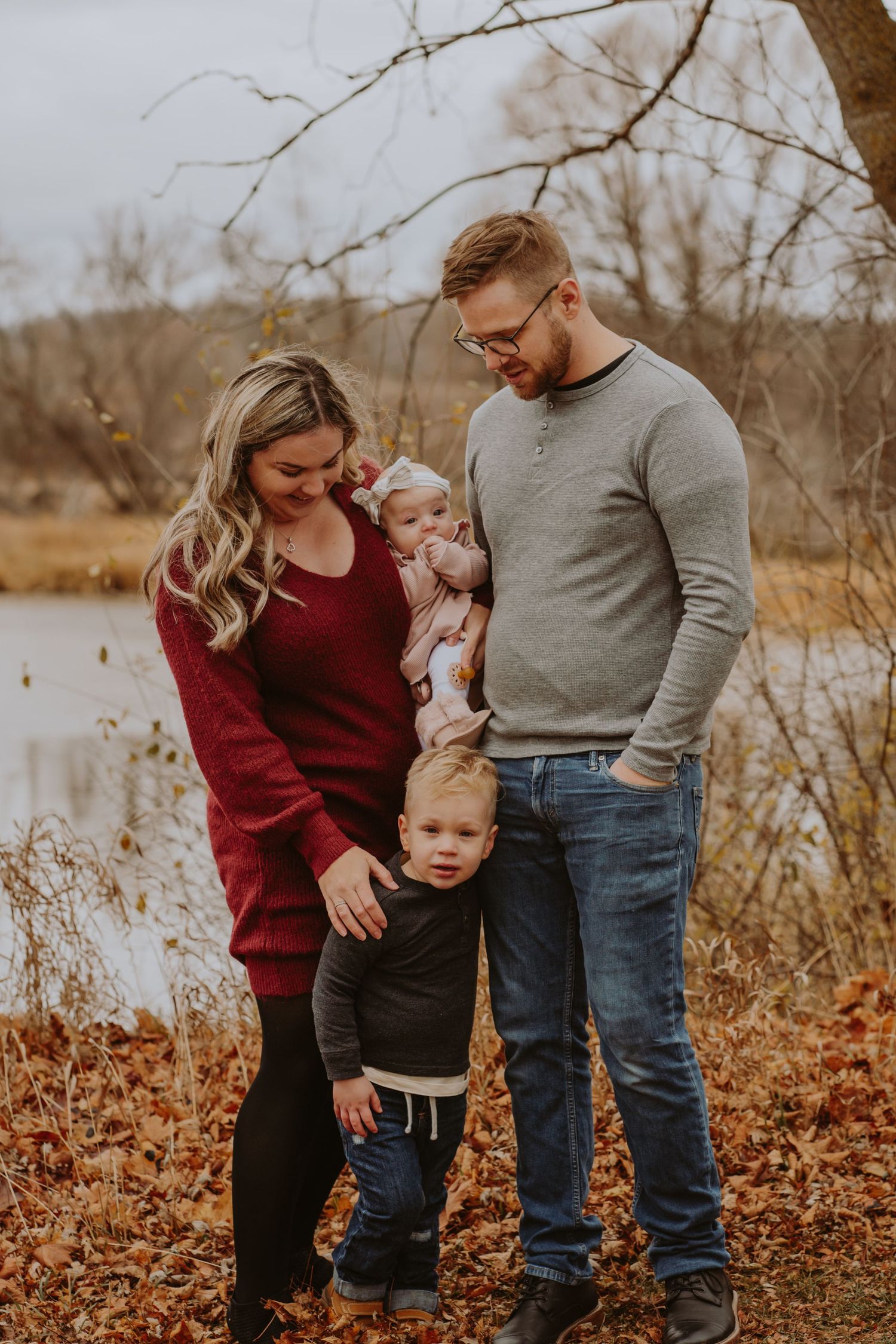Image of family in front of water.