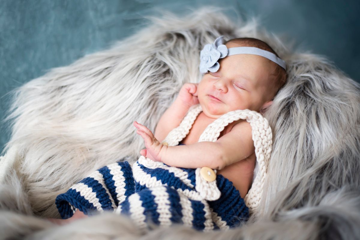 Newborn cute jumper outfit asleep