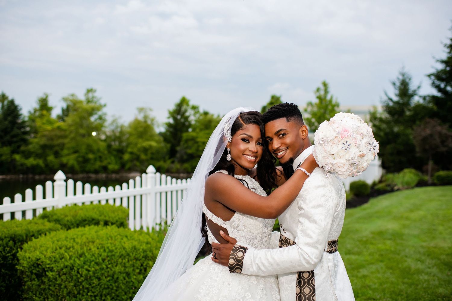 Bride and groom embrace at Savannah Center Chappell Crossing wedding venue.
