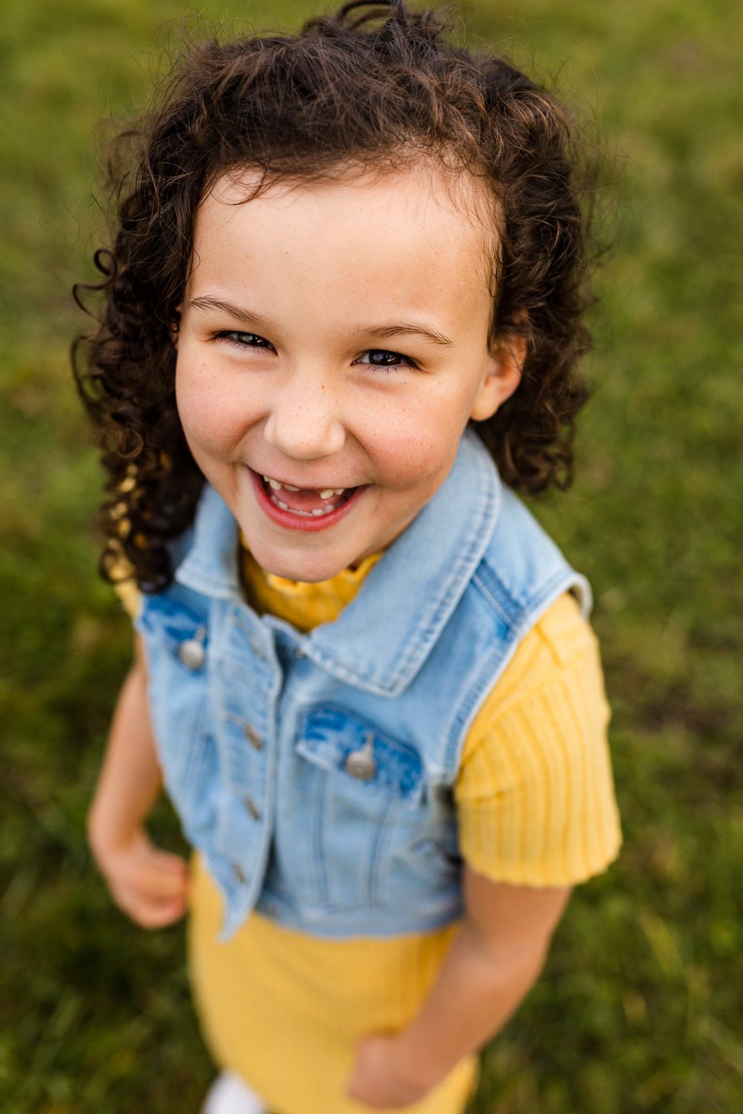 Portrait of a smiling child in North Bend, at outdoor fall family photos.