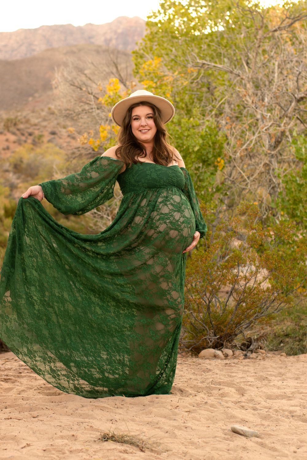Green flowy dress in the Las Vegas Desert for Maternity