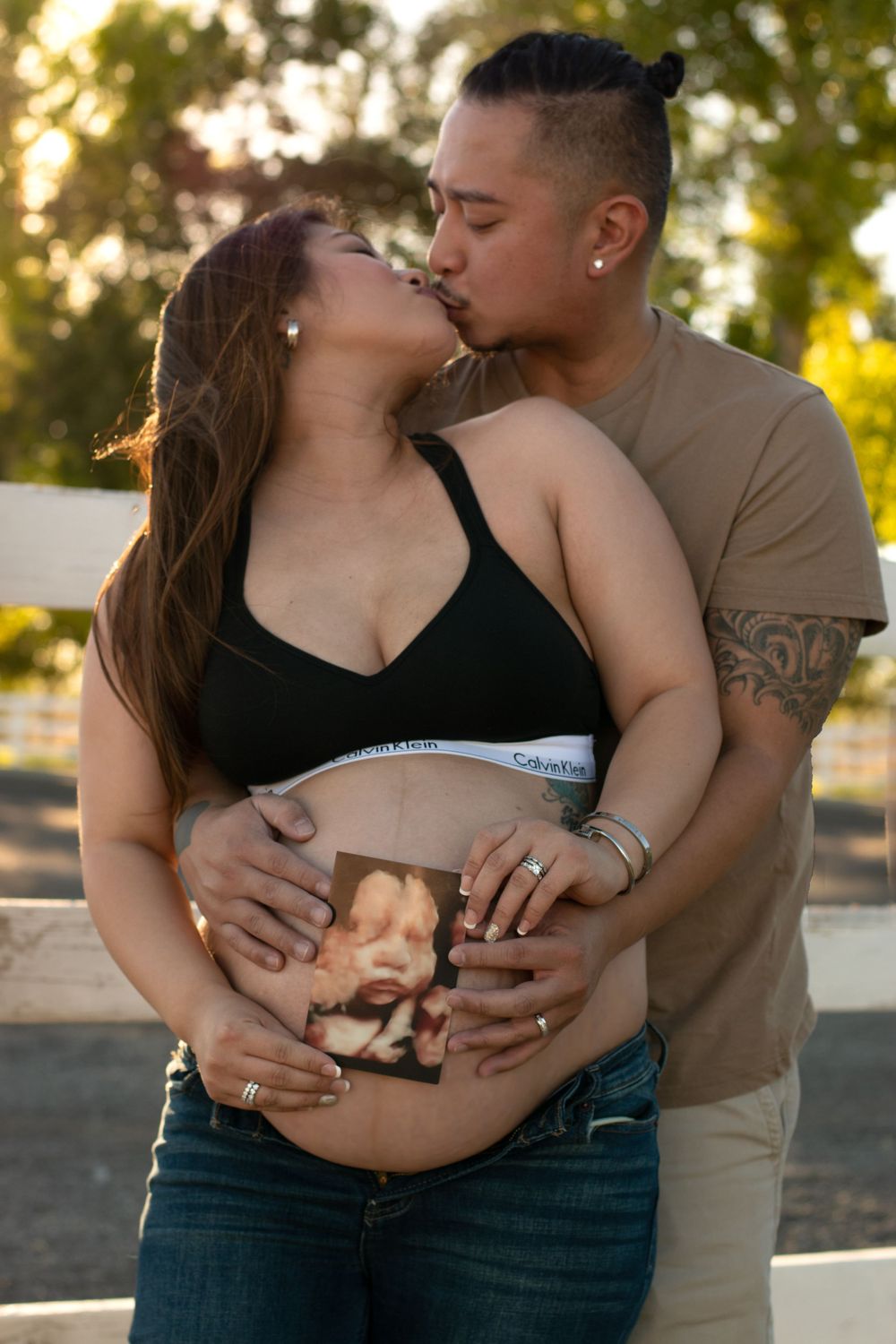 Maternity poses with ultrasound outdoors or indoors